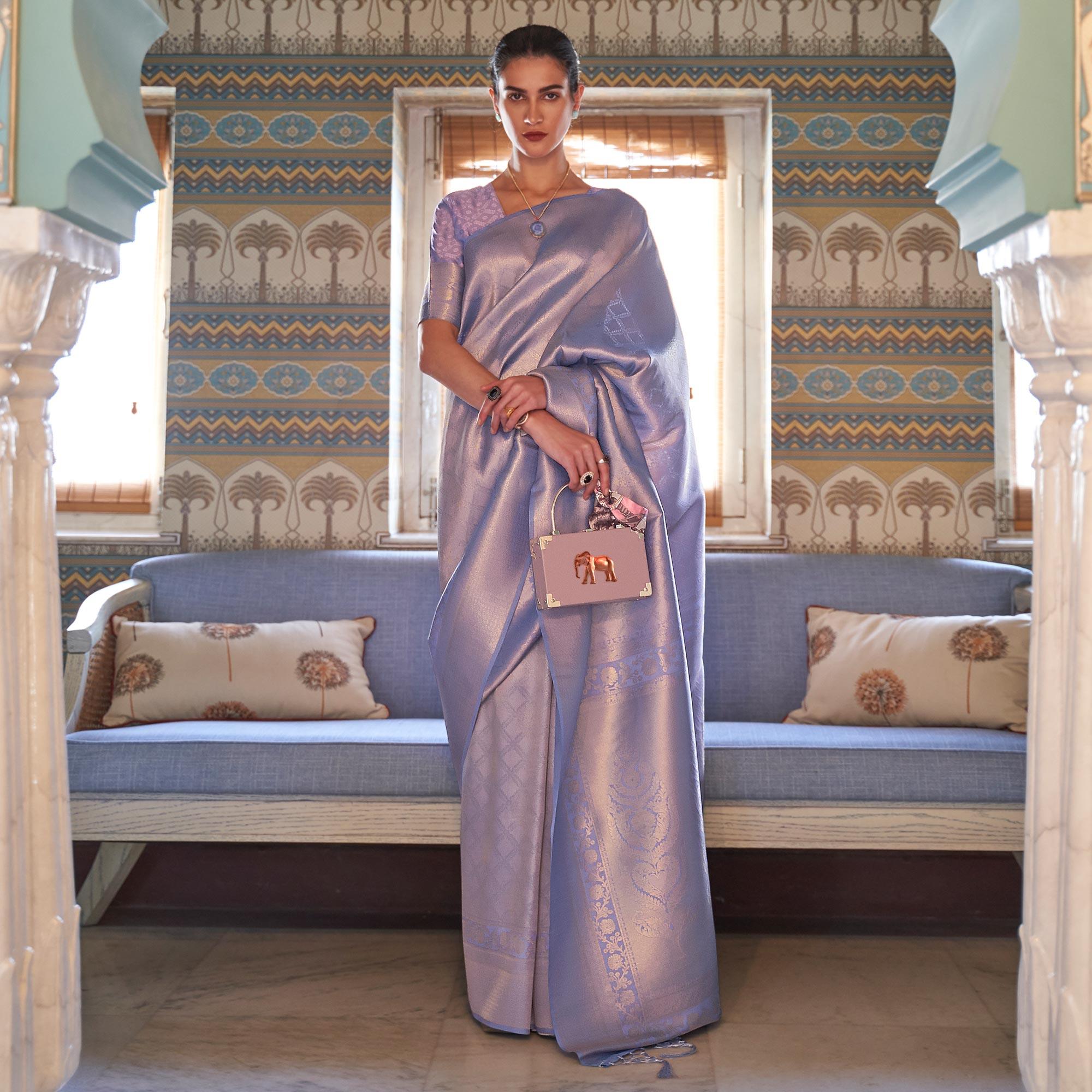 Lavender Woven Art Silk Saree With Tassels - Peachmode