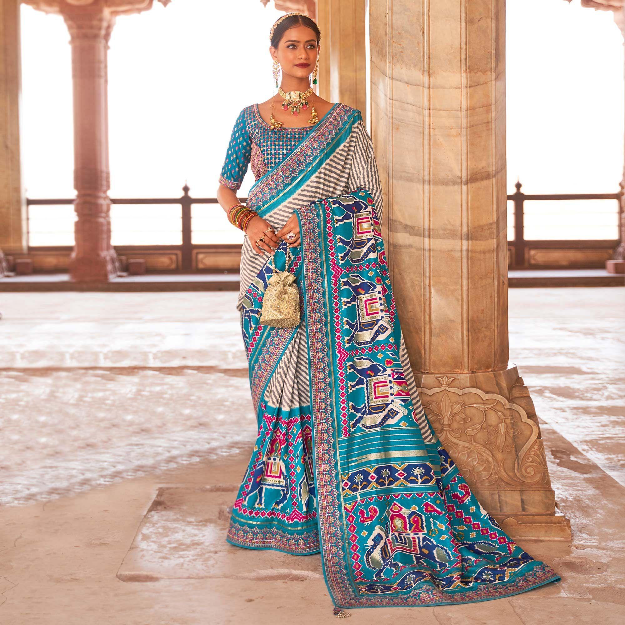 Light Blue & Off White Patola Printed-Sequence Embroidered Pure Silk Saree - Peachmode