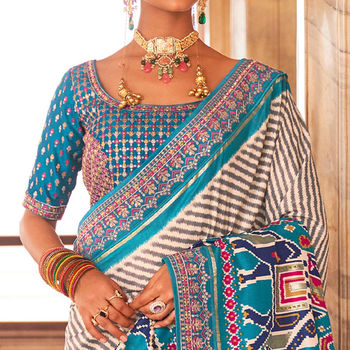 Light Blue & Off White Patola Printed-Sequence Embroidered Pure Silk Saree - Peachmode