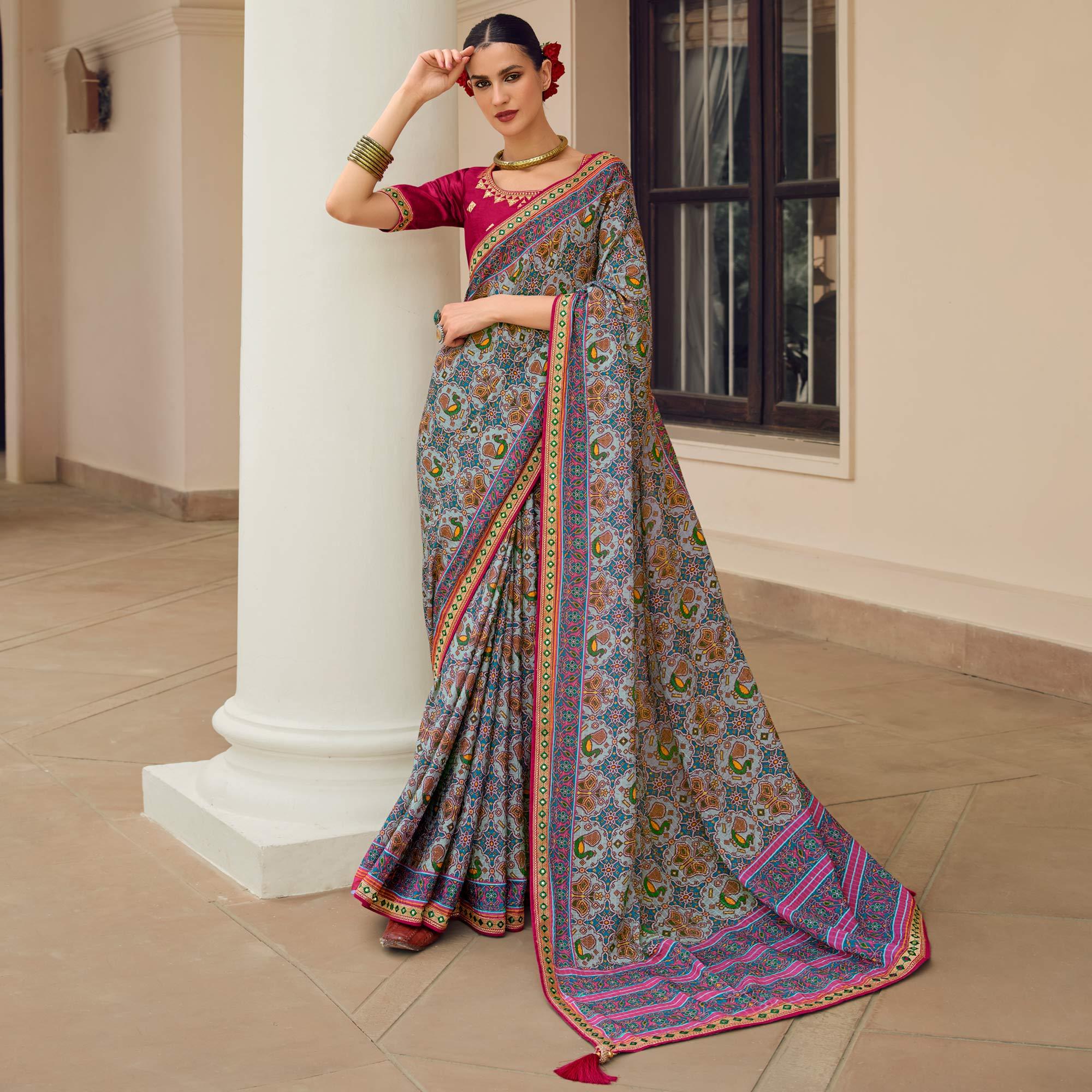Light Blue Printed With Embellished Chiffon Saree With Tassels - Peachmode