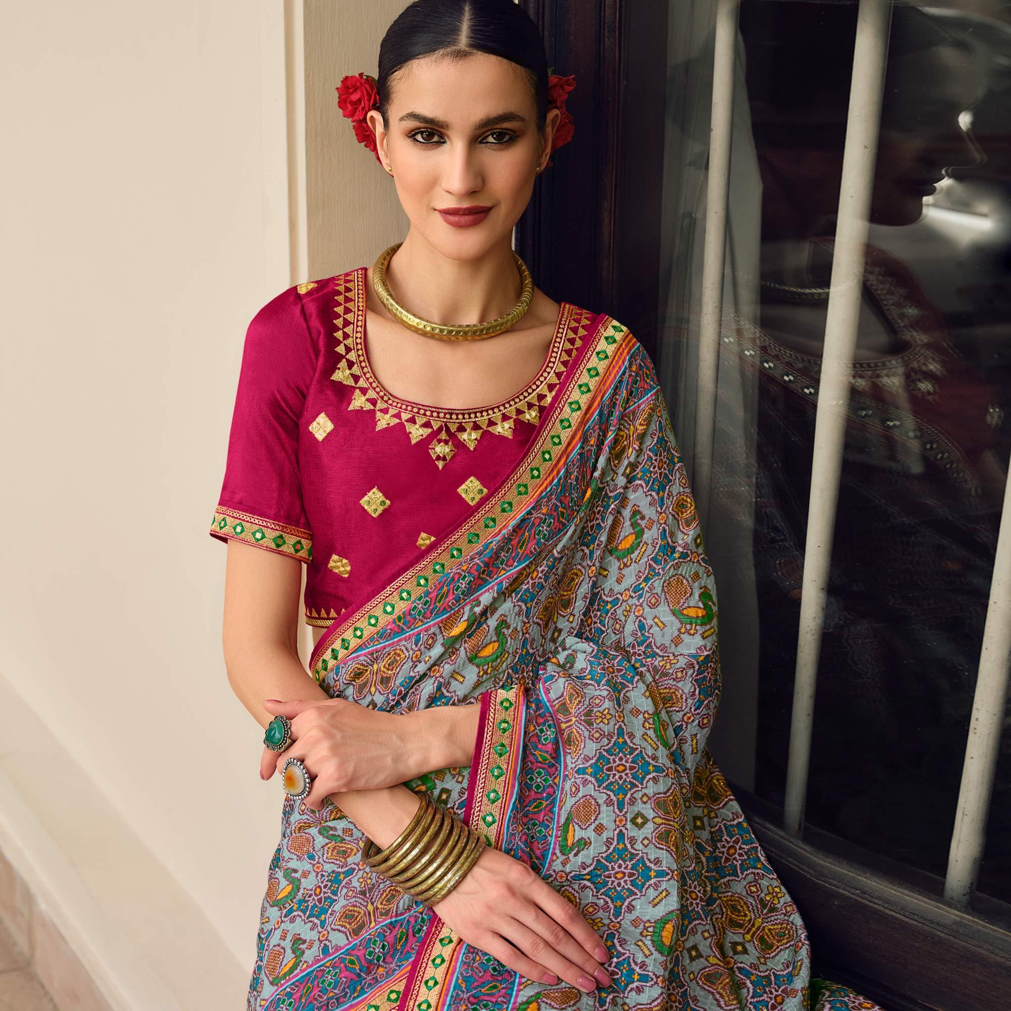 Light Blue Printed With Embellished Chiffon Saree With Tassels - Peachmode