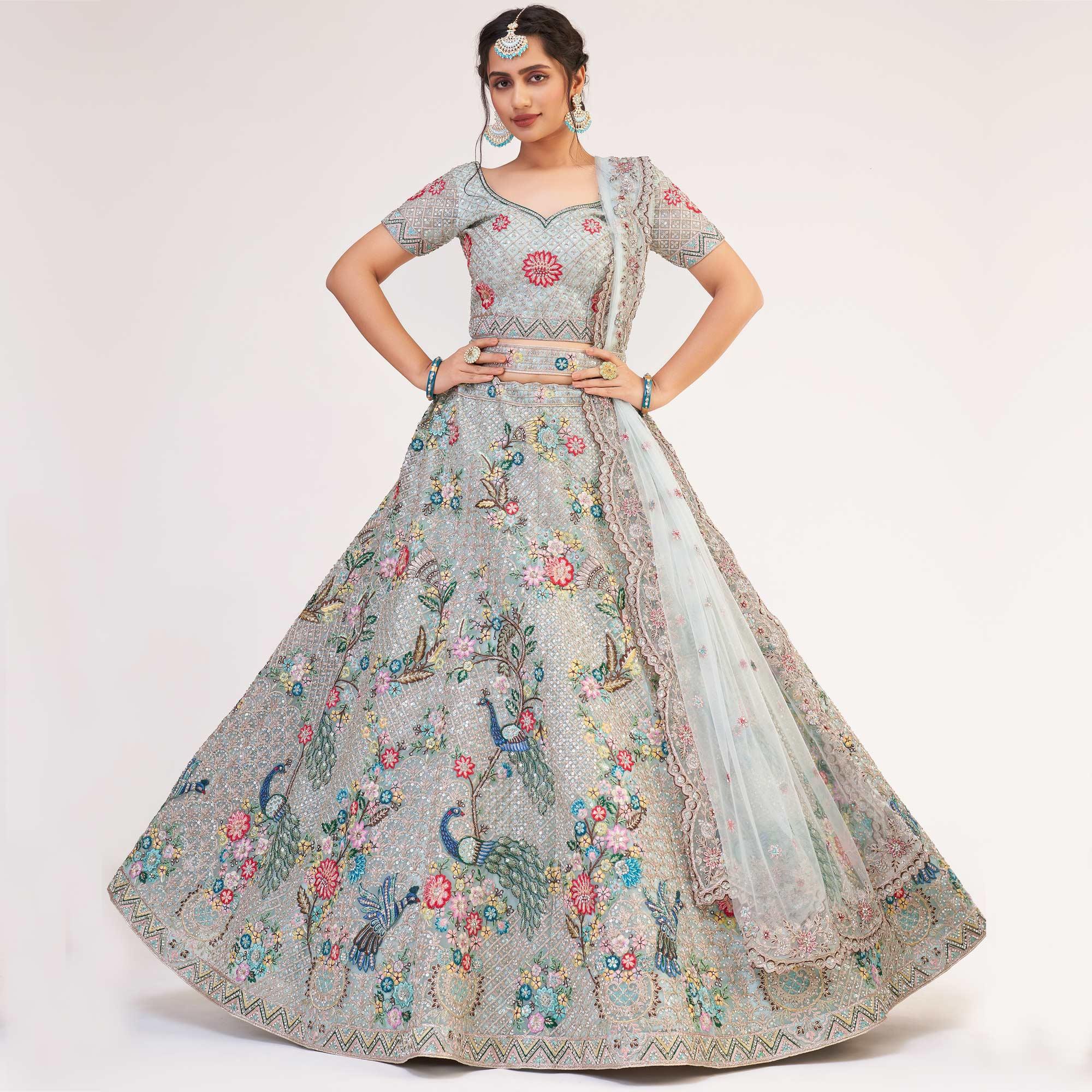 Light Firozi Wedding Wear Embellished Heavy Butterfly Net Lehenga Choli - Peachmode