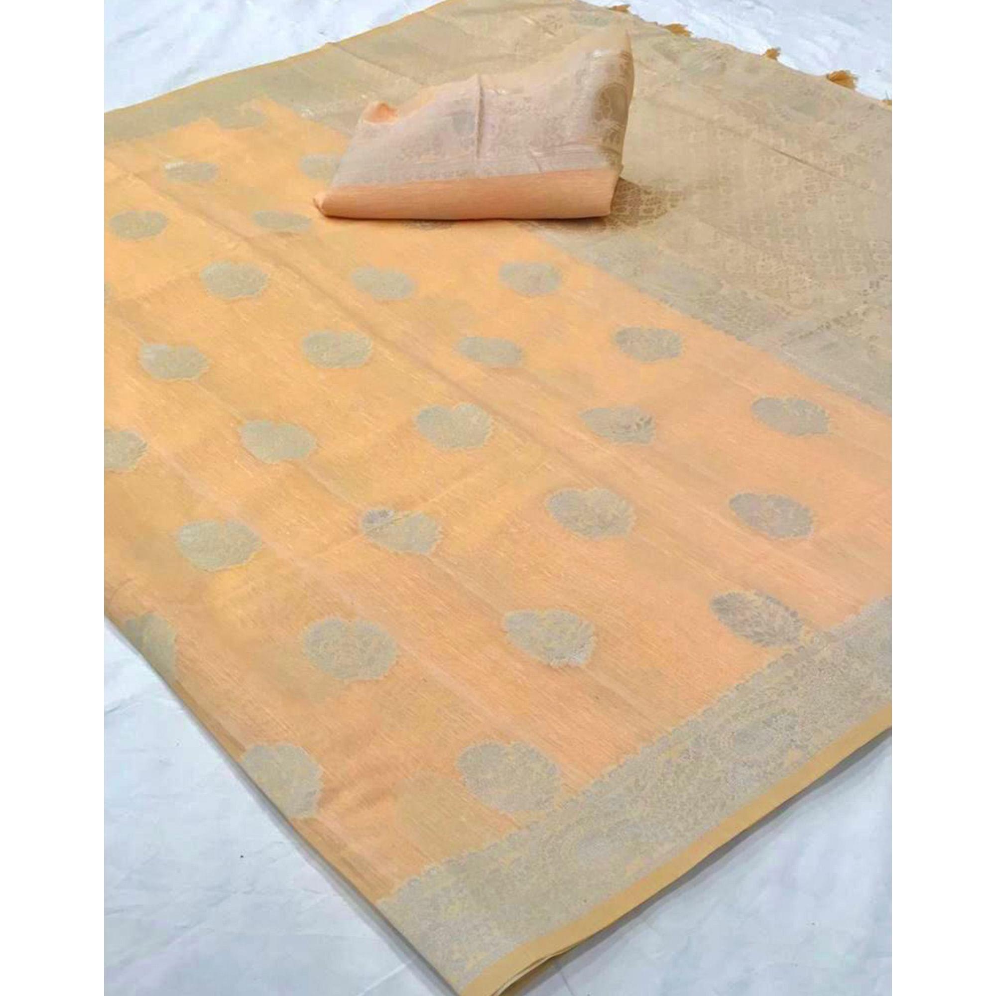 Light Orange Woven Linen Saree With Tassels - Peachmode