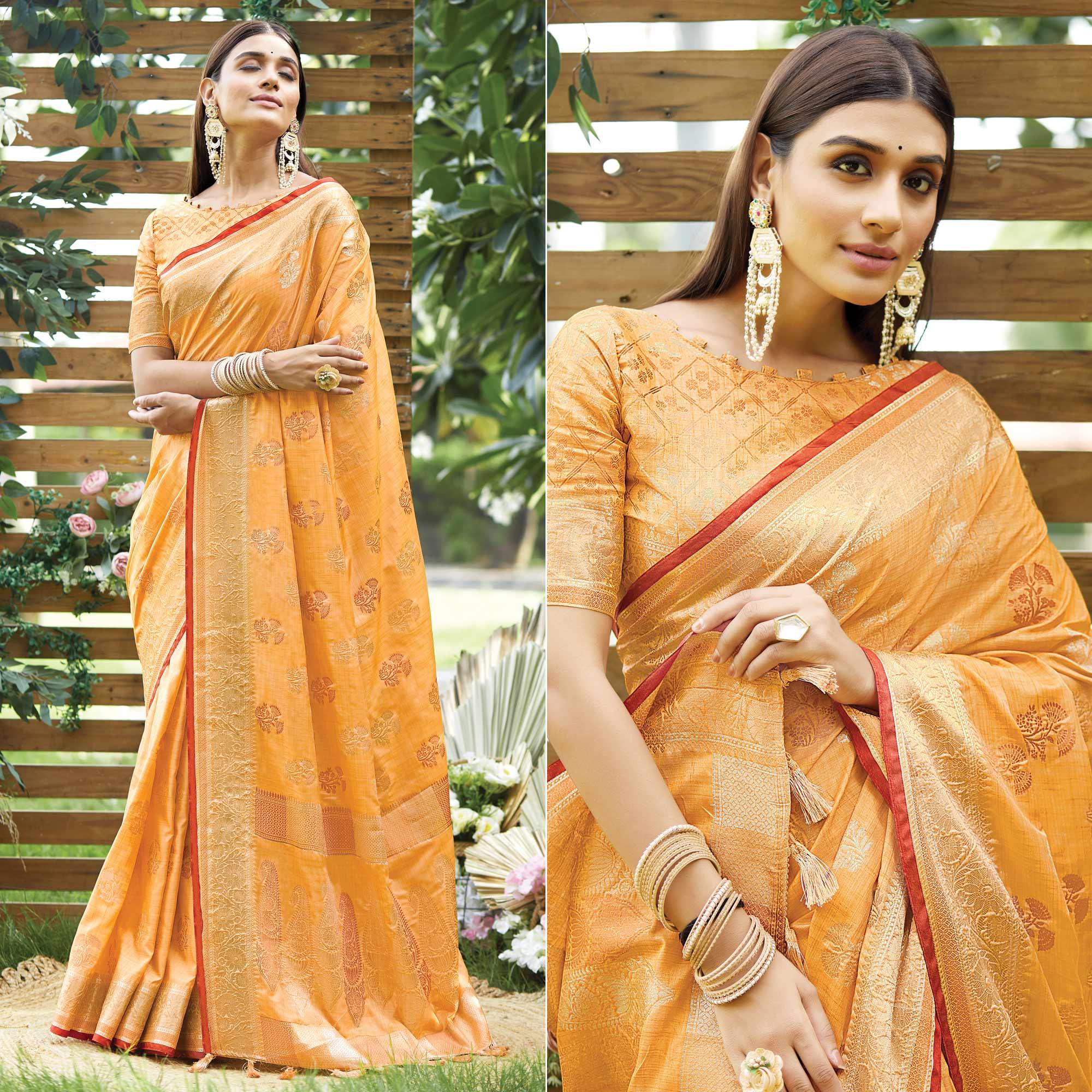 Light Orange Woven Raw Silk Saree With Tassels - Peachmode