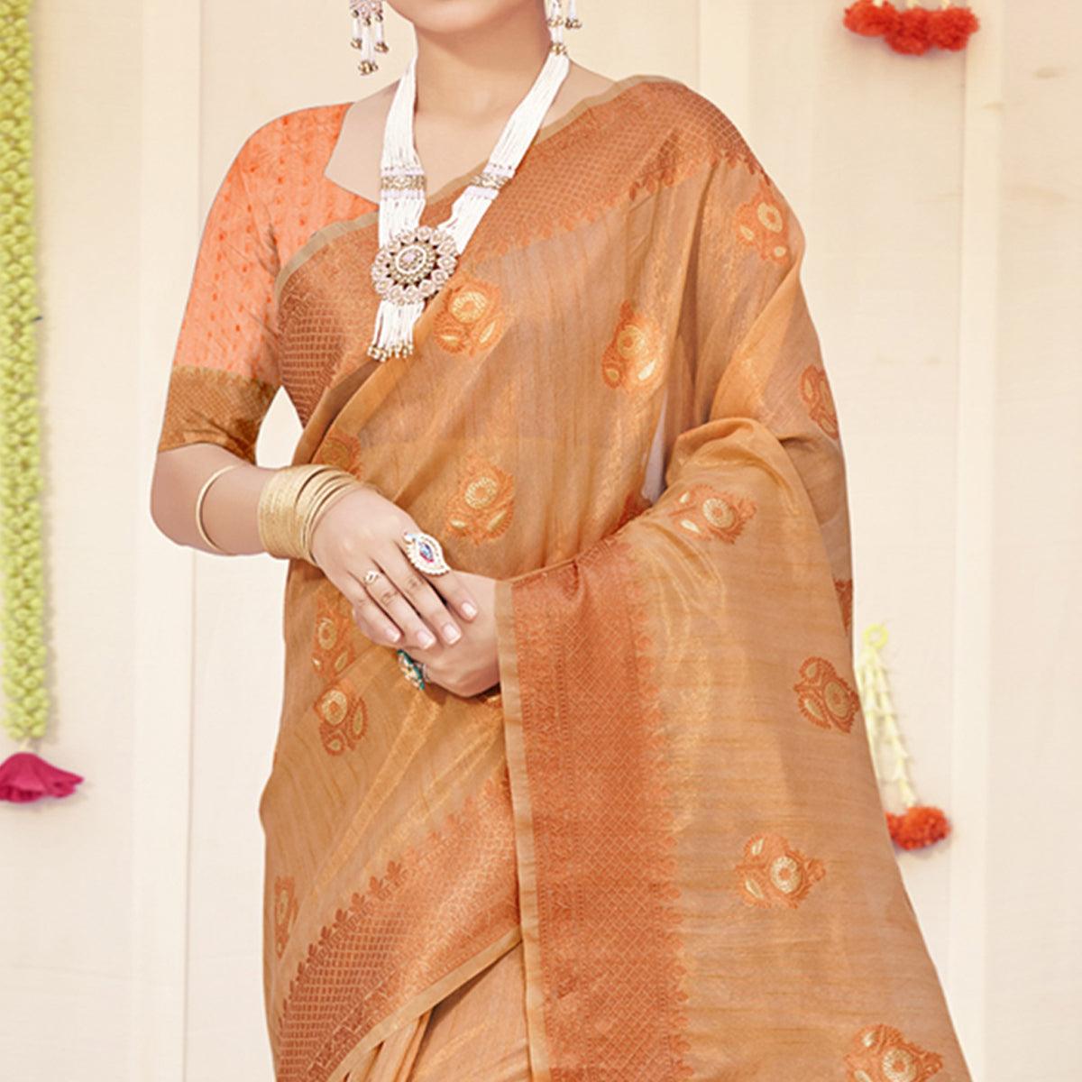 Light Peach Woven Organza Saree With Tassels - Peachmode