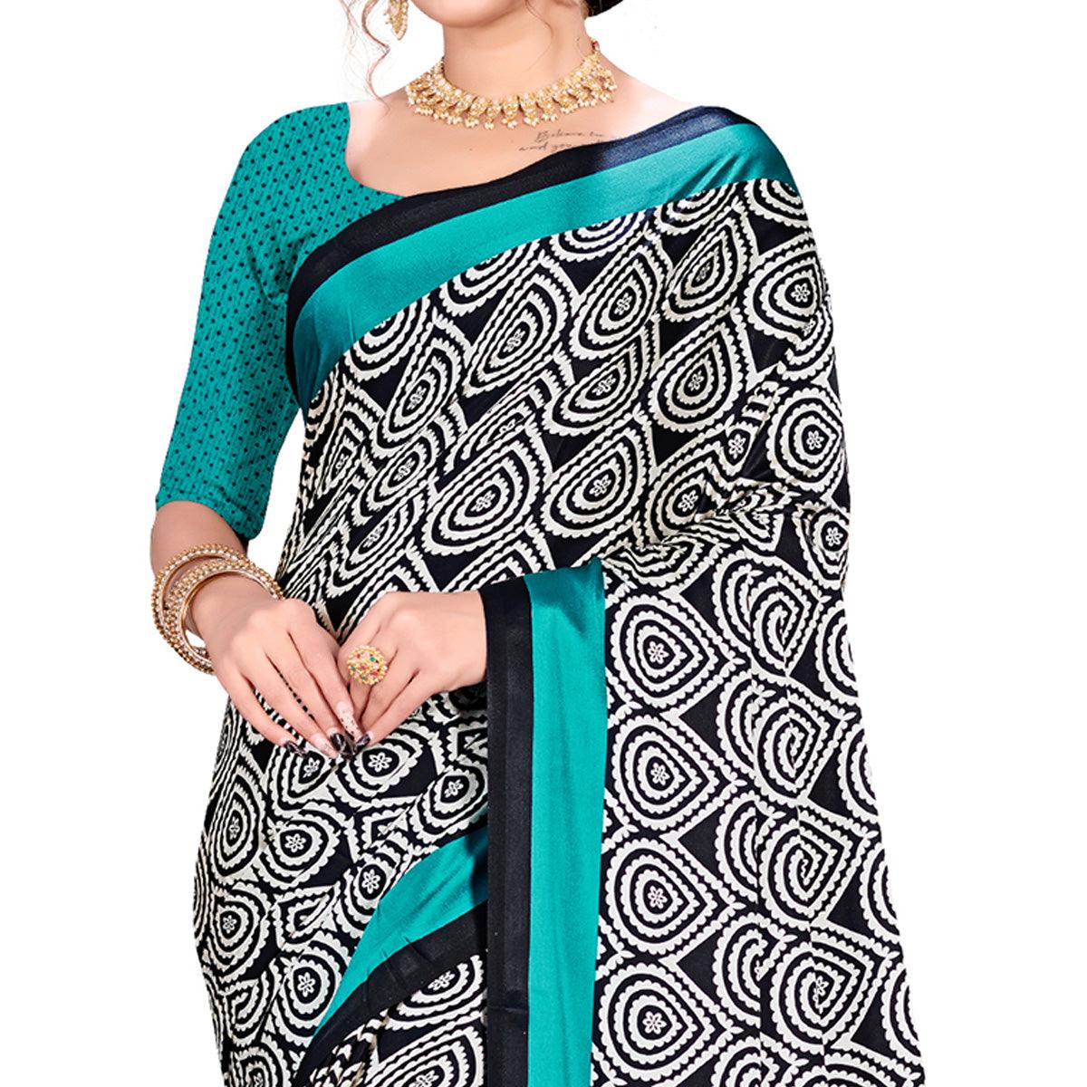 Lovely Blue-Black Colored Festive Wear Printed Satin Crepe Saree - Peachmode