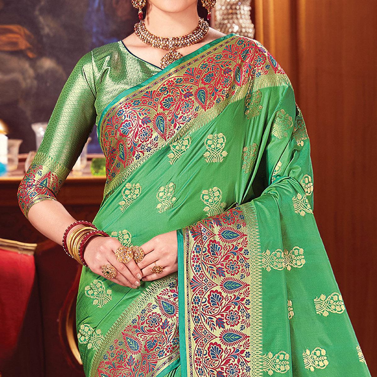 Lovely Green Colored Festive Wear Woven Silk Saree - Peachmode