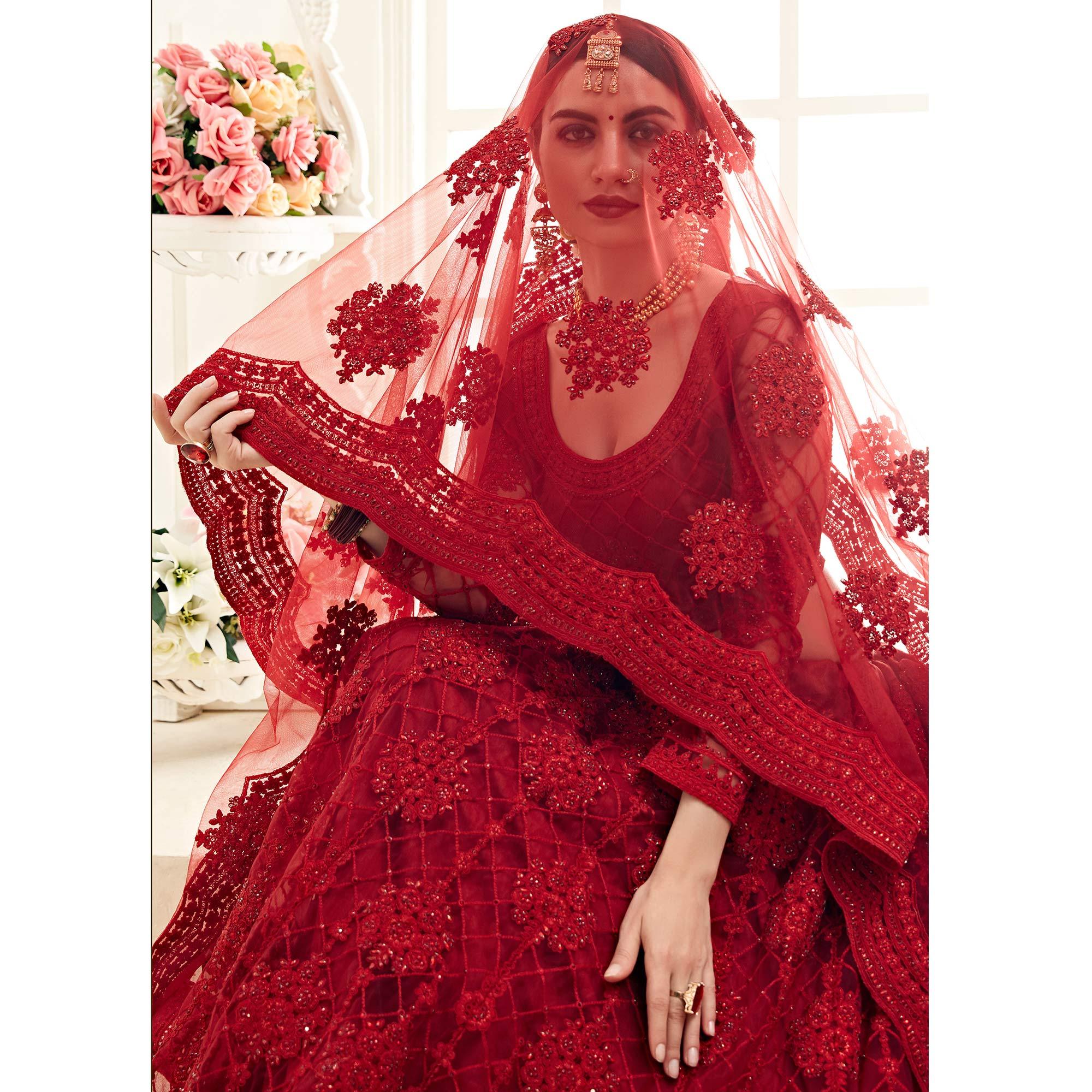 Lovely Red Colored Cording Embroidery Wedding Wear Net Lehenga Choli - Peachmode