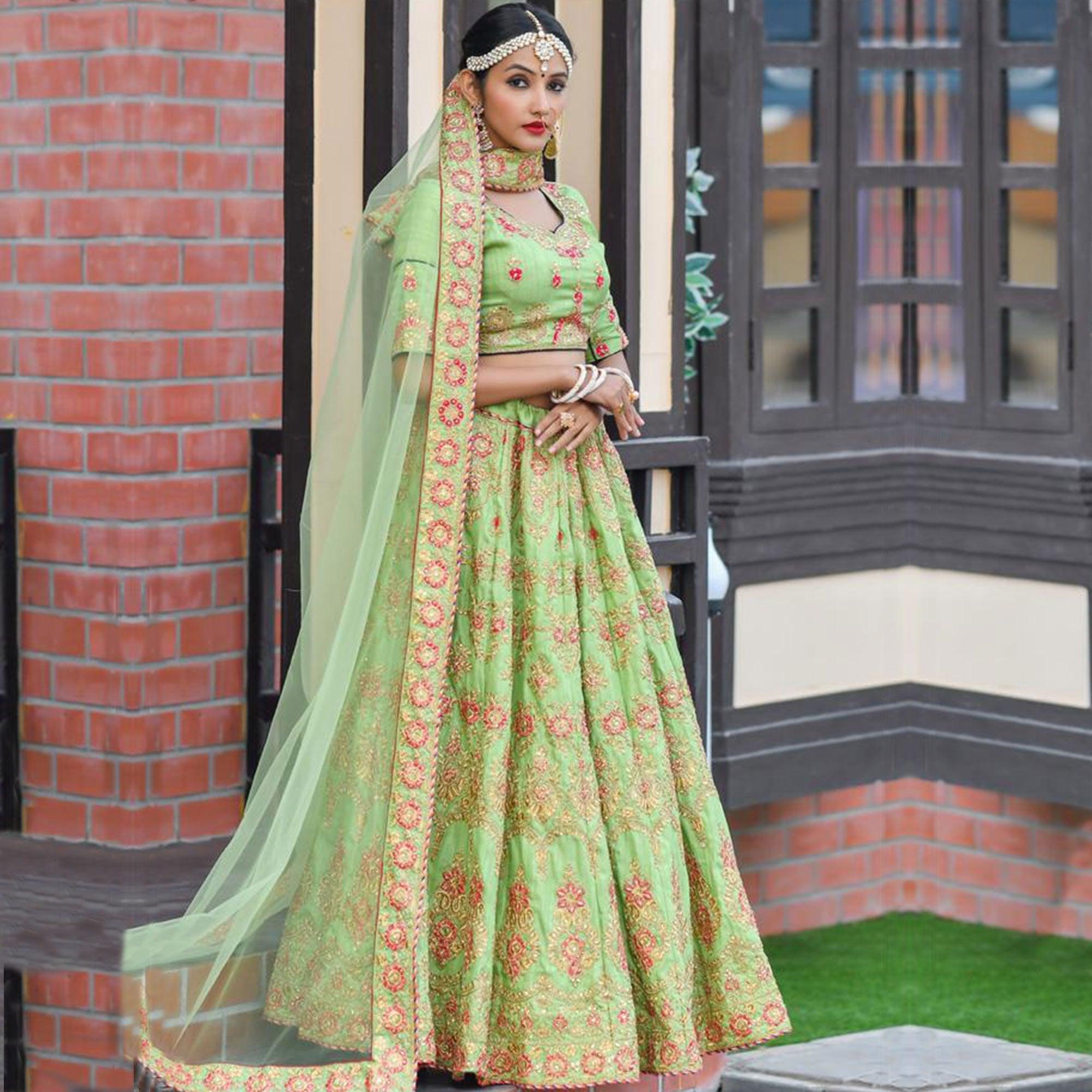Magnetic Green Colored Party Wear Embroidered Silk Lehenga Choli - Peachmode