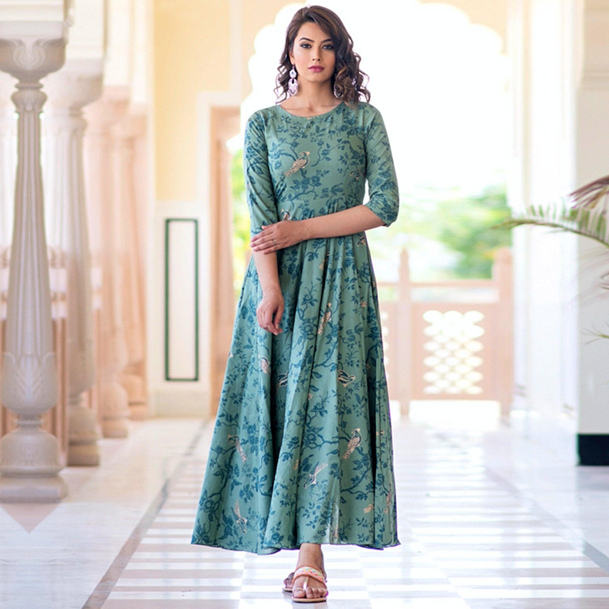 Magnetic Light Aqua Colored Partywear Printed Muslin Blend Long Kurti - Peachmode