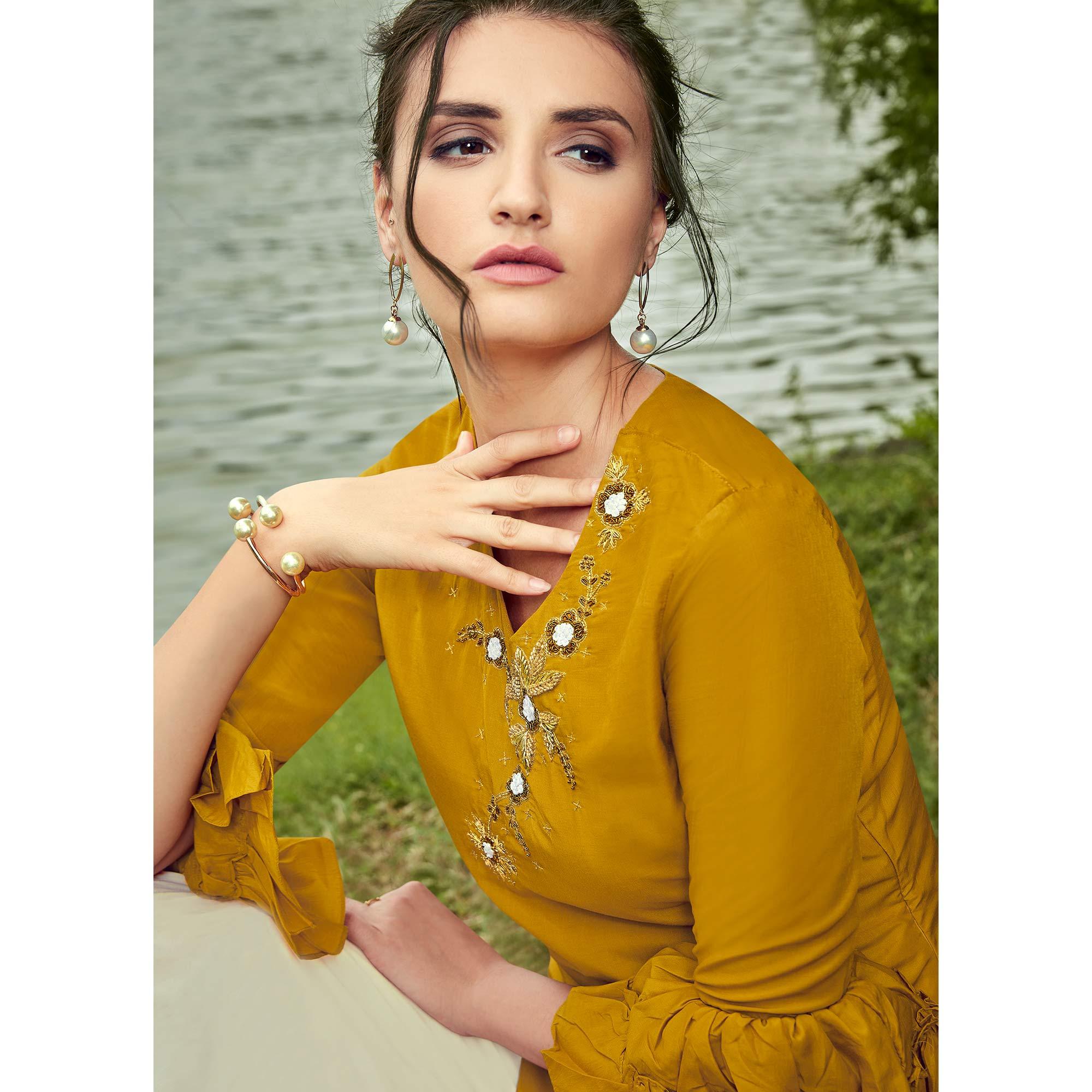 Majesty Mustard Yellow Colored Partywear Hand Embroidered Muslin Silk Kurti-Palazzo Set - Peachmode