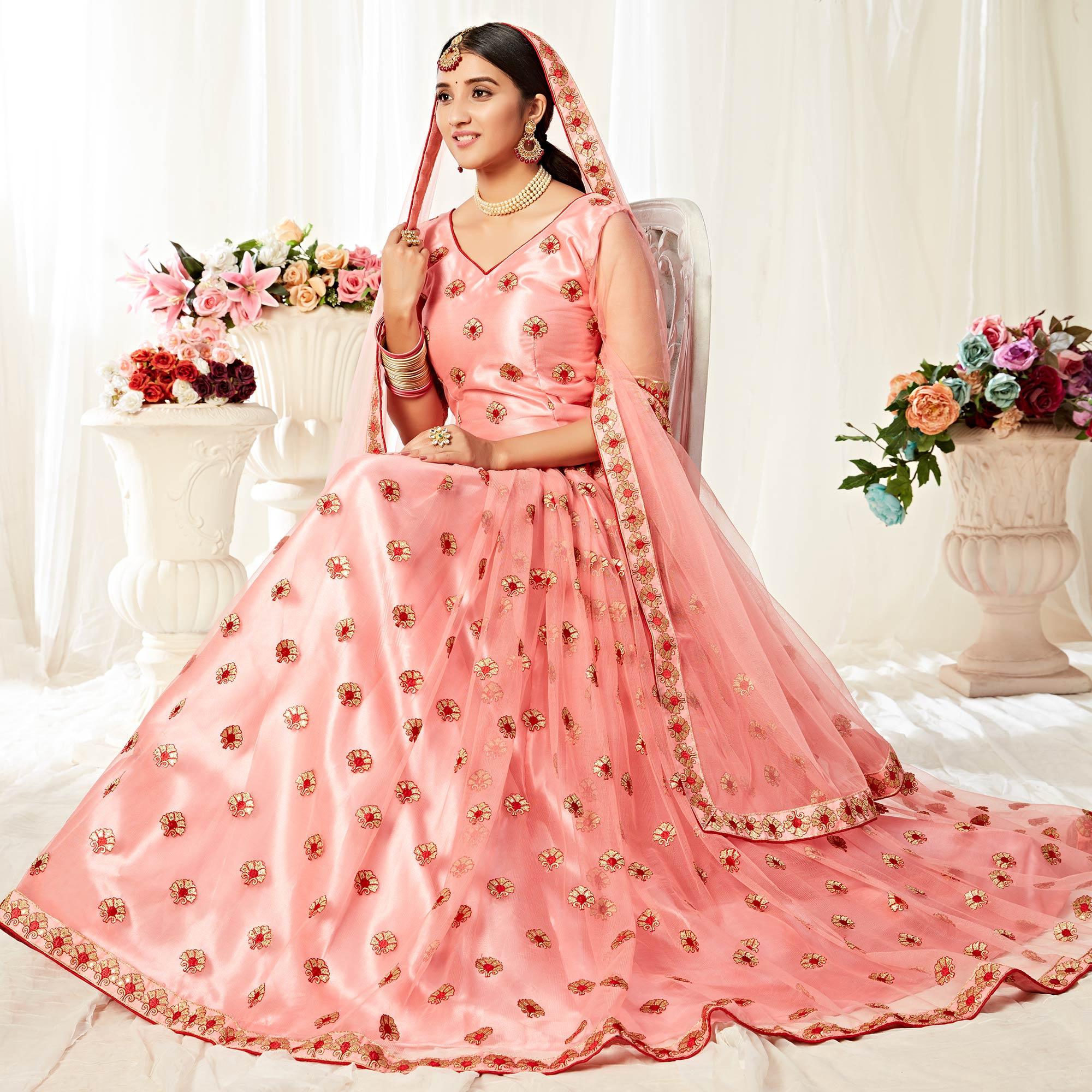 Majesty Peach Colored Wedding Wear Embroidered Heavy Net Lehenga Choli - Peachmode