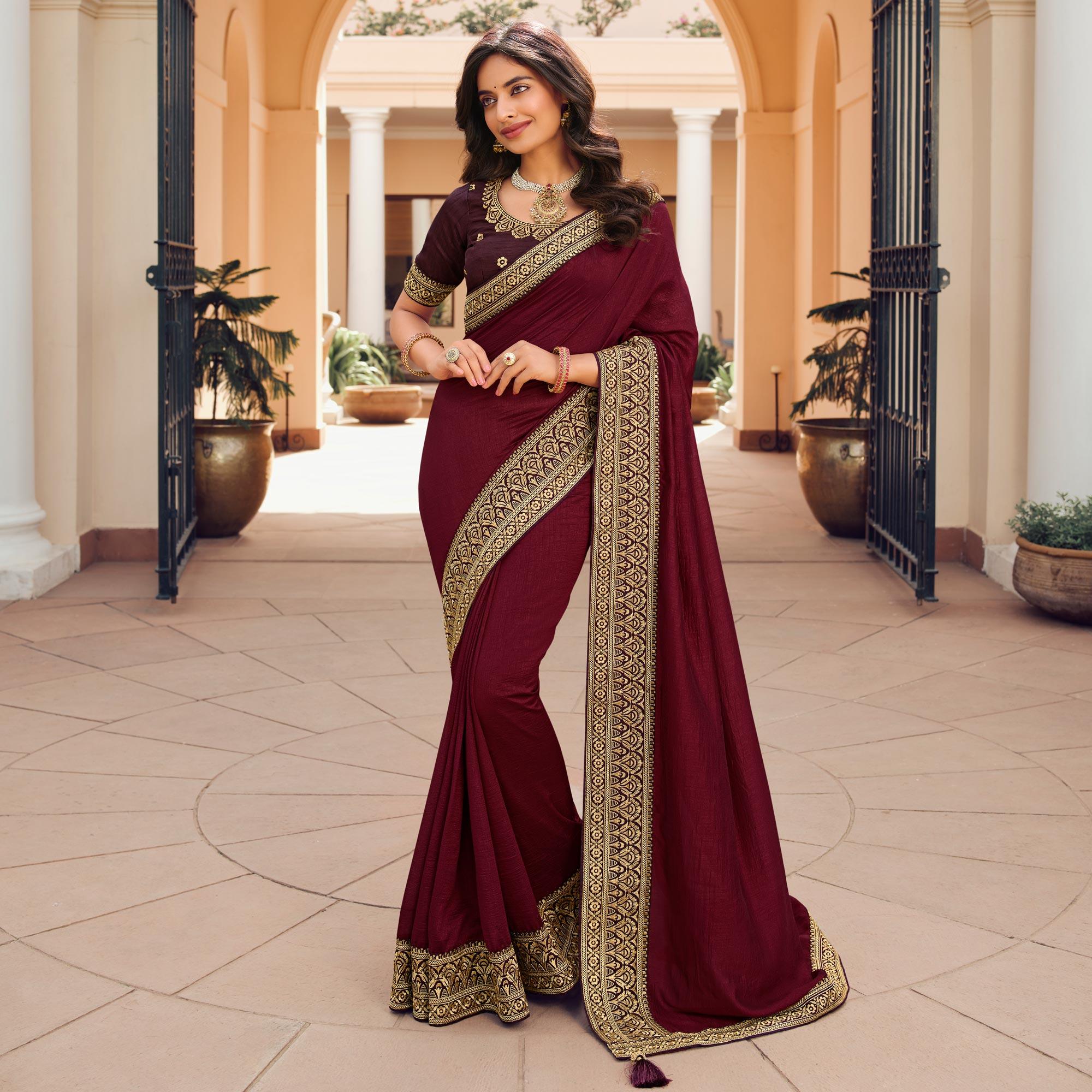 Maroon Solid Vichitra Silk Saree With Tassels - Peachmode