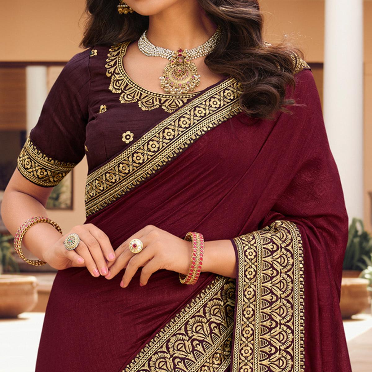 Maroon Solid Vichitra Silk Saree With Tassels - Peachmode
