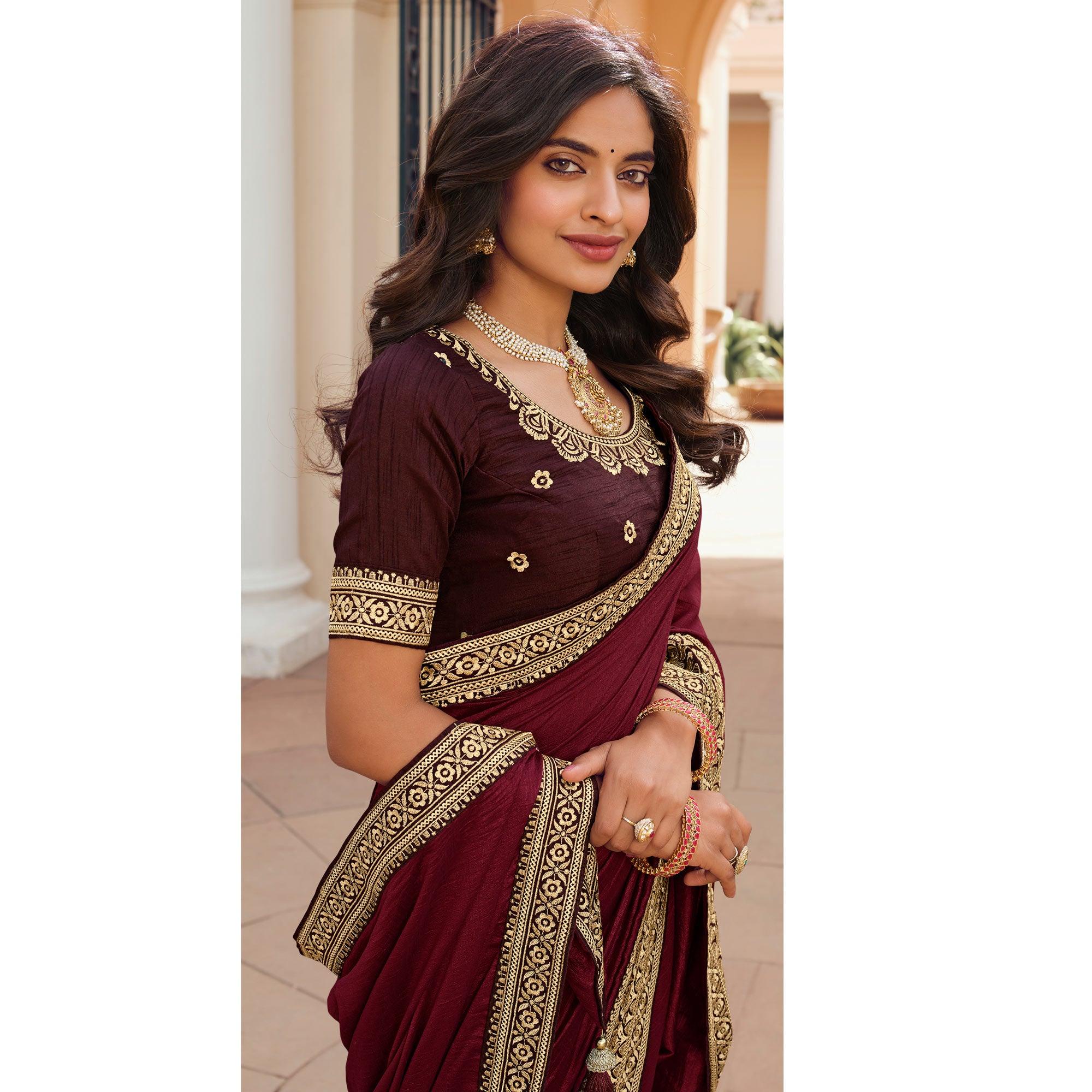 Maroon Solid Vichitra Silk Saree With Tassels - Peachmode