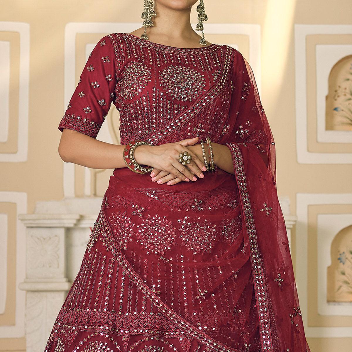 Maroon Wedding Wear Embellished Netted Lehenga Choli - Peachmode
