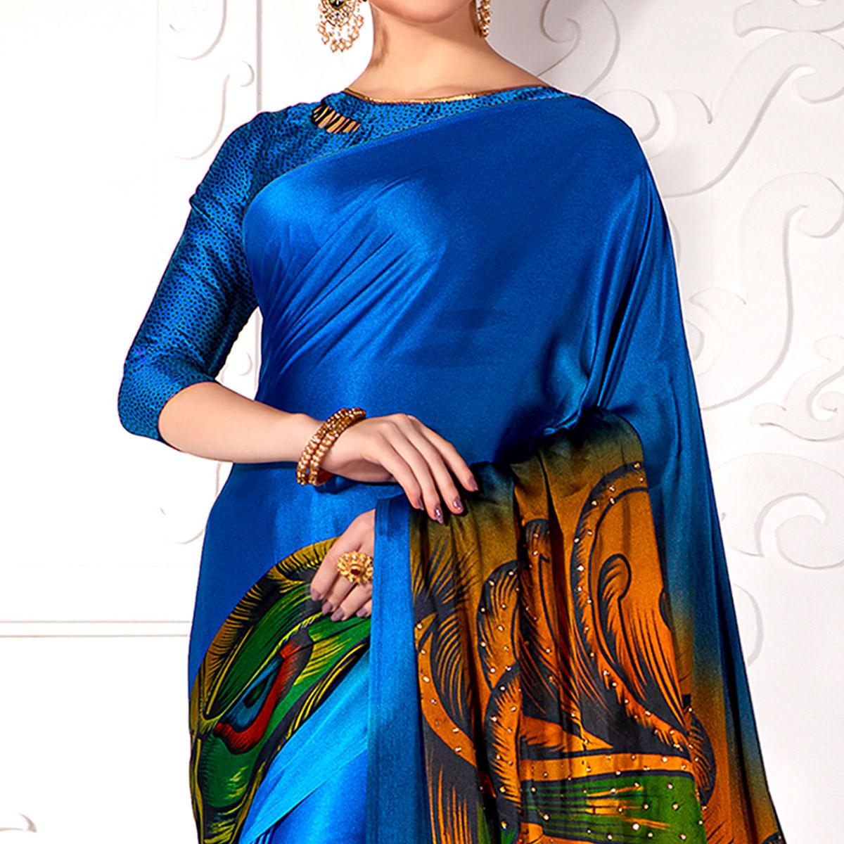 Marvellous Blue Colored Partywear Peacock Feather Printed Satin Saree - Peachmode