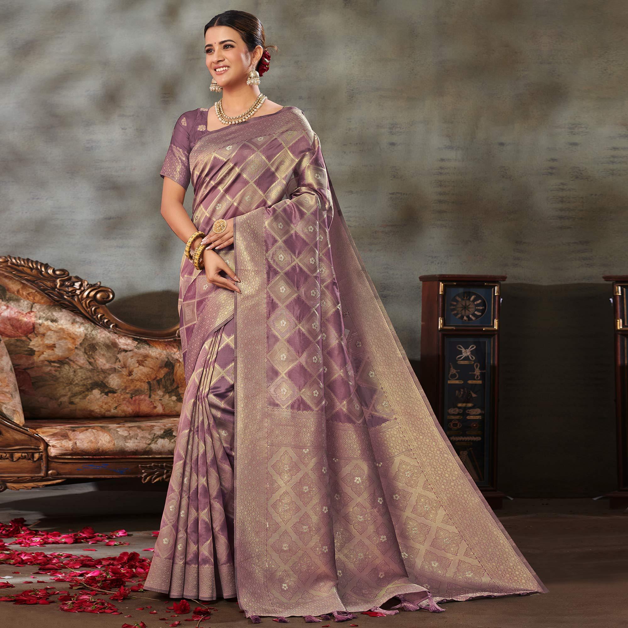 Mauve Woven Organza Saree With Tassels - Peachmode