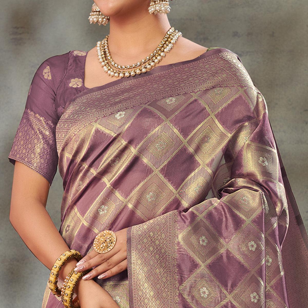 Mauve Woven Organza Saree With Tassels - Peachmode