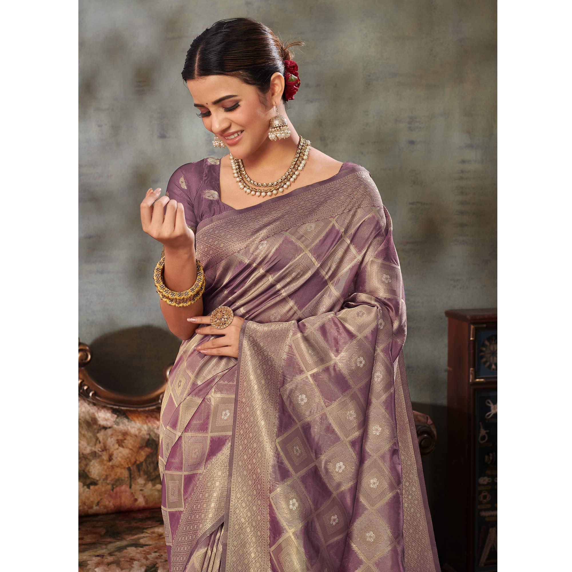 Mauve Woven Organza Saree With Tassels - Peachmode