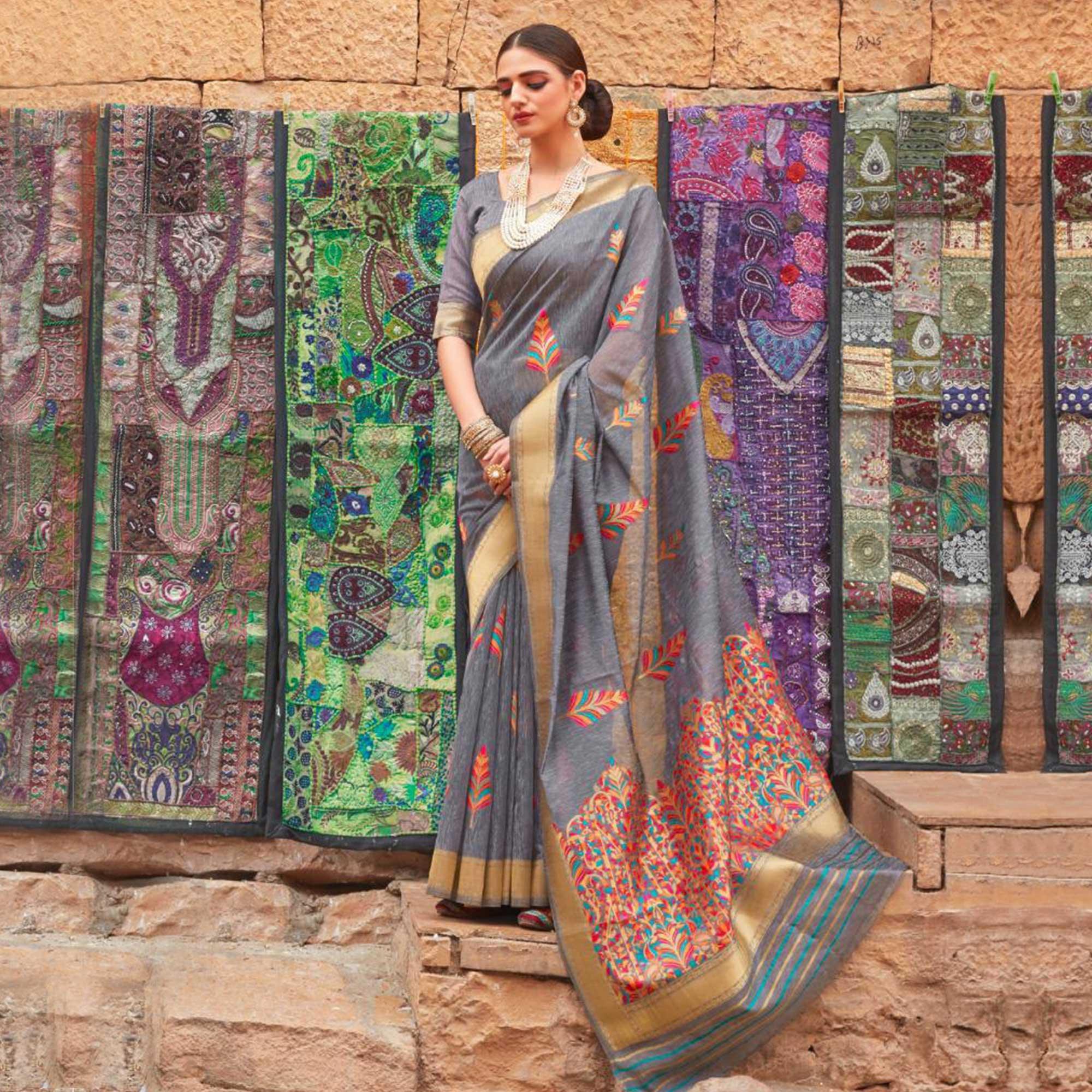 Mesmeric Grey Colored Partywear Printed Linen Saree - Peachmode