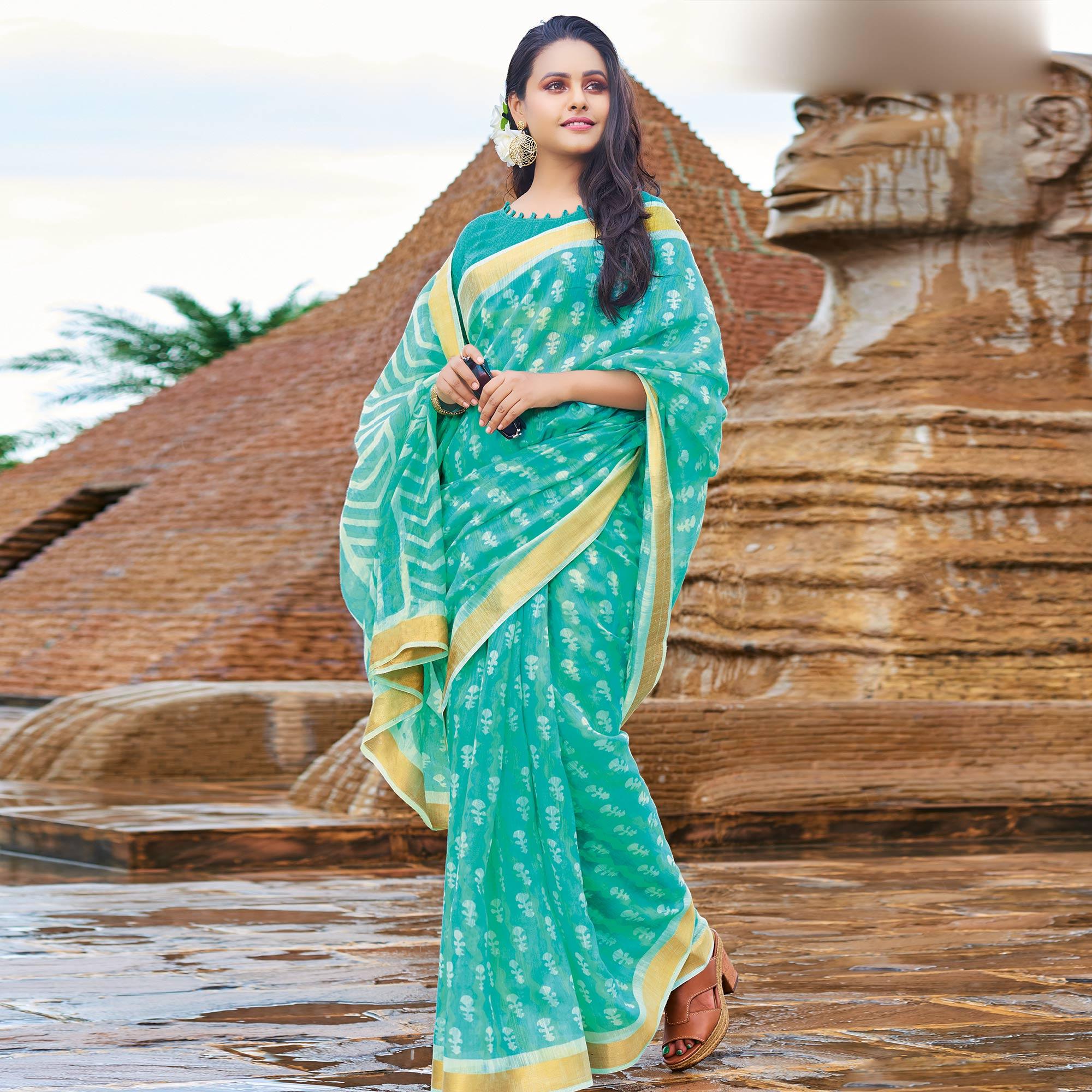 Mesmeric Turquoise Green Colored Casual Wear Printed Cotton Saree - Peachmode