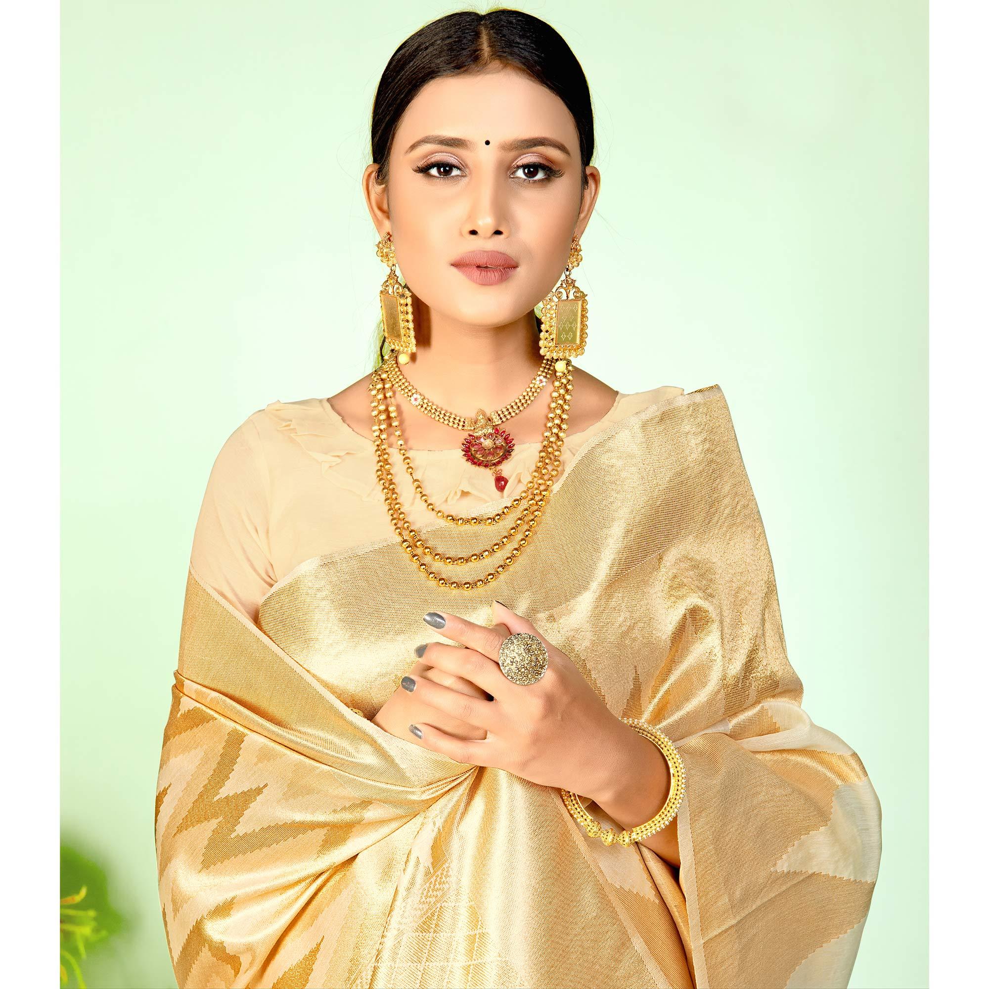 Mesmerising Beige Colored Festive Wear Woven Silk Saree - Peachmode