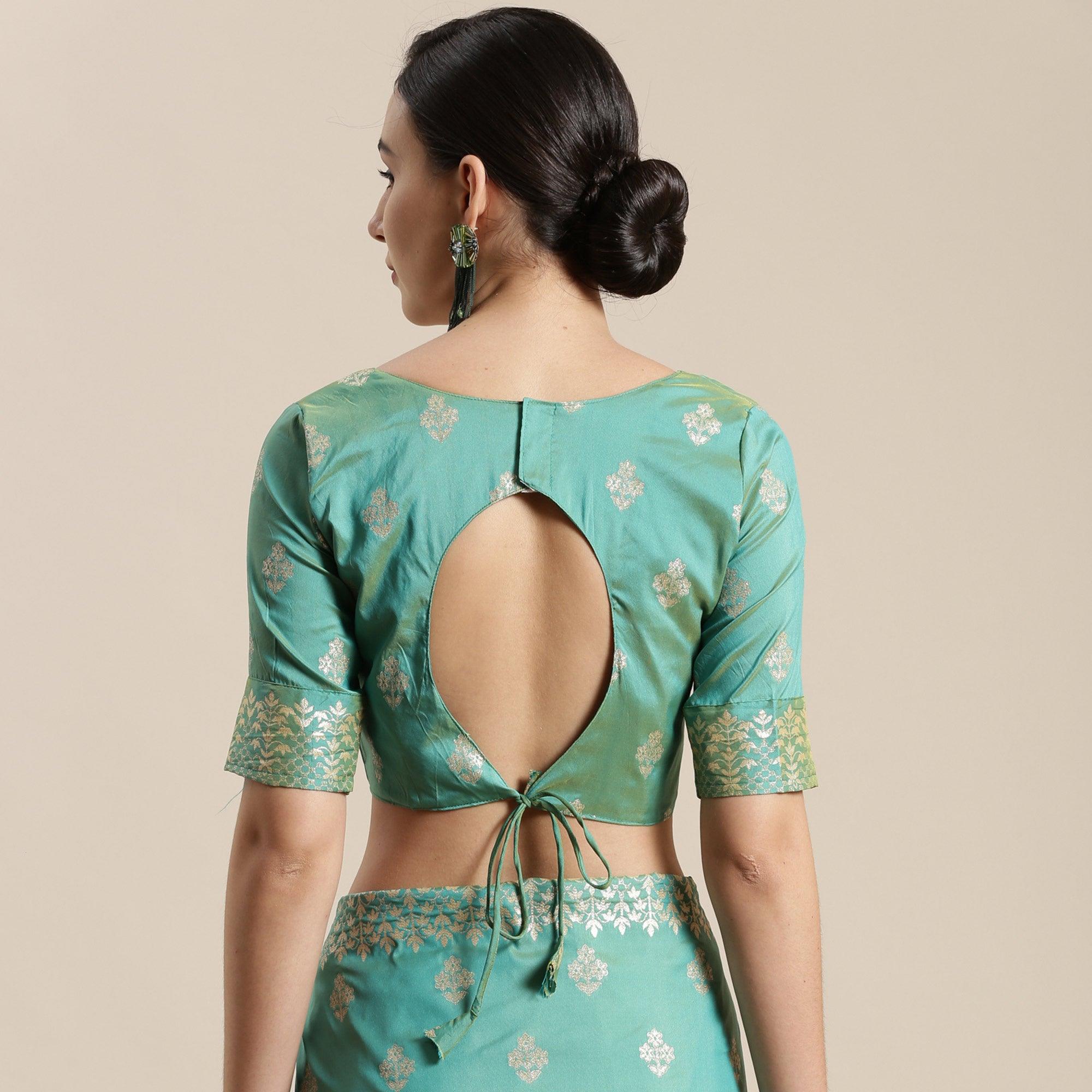 Mesmerising Sea Green Colored Festive Wear Silk Blend Woven Floral Saree With Tassels - Peachmode