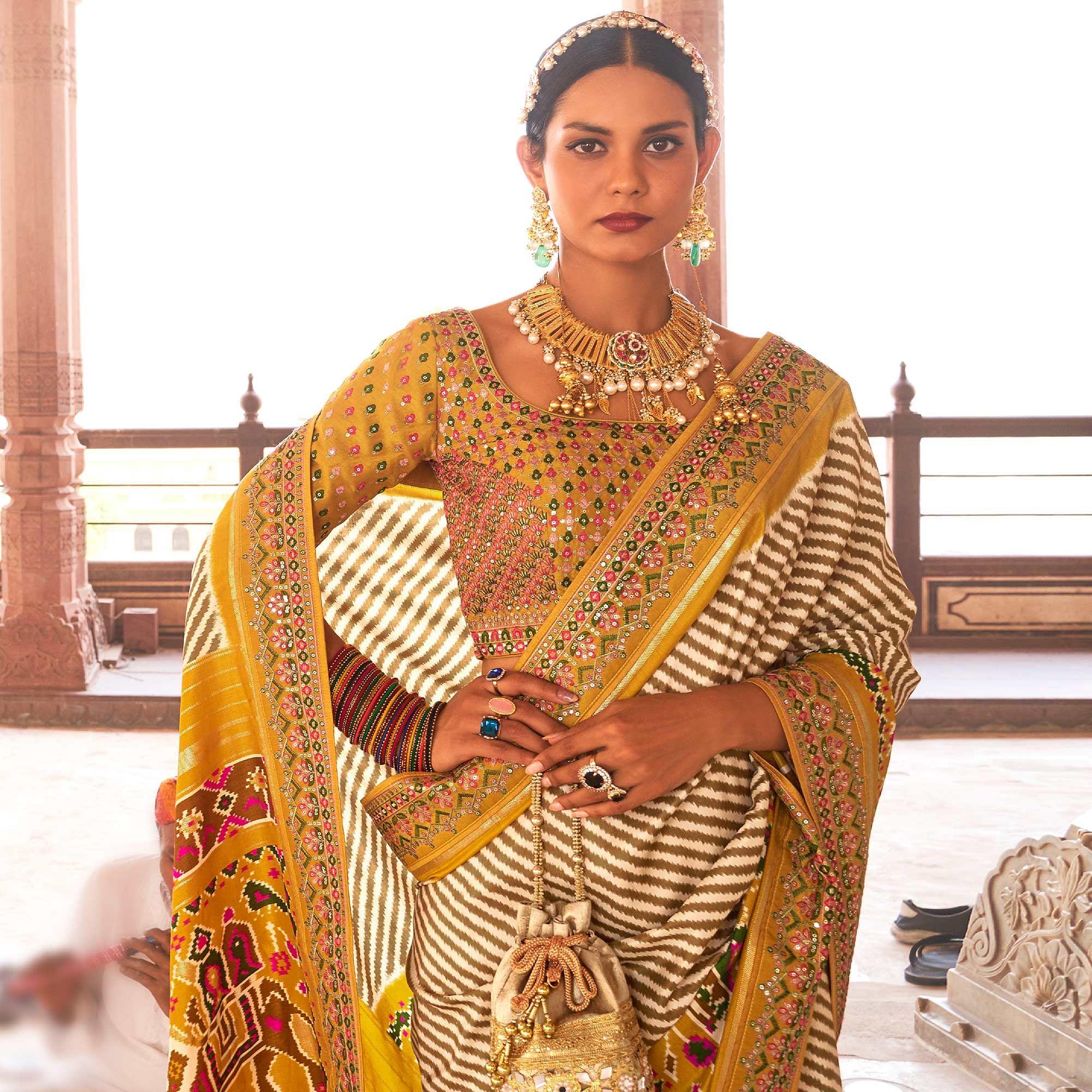 Mustard & Off White Patola Printed-Sequence Embroidered Pure Silk Saree - Peachmode
