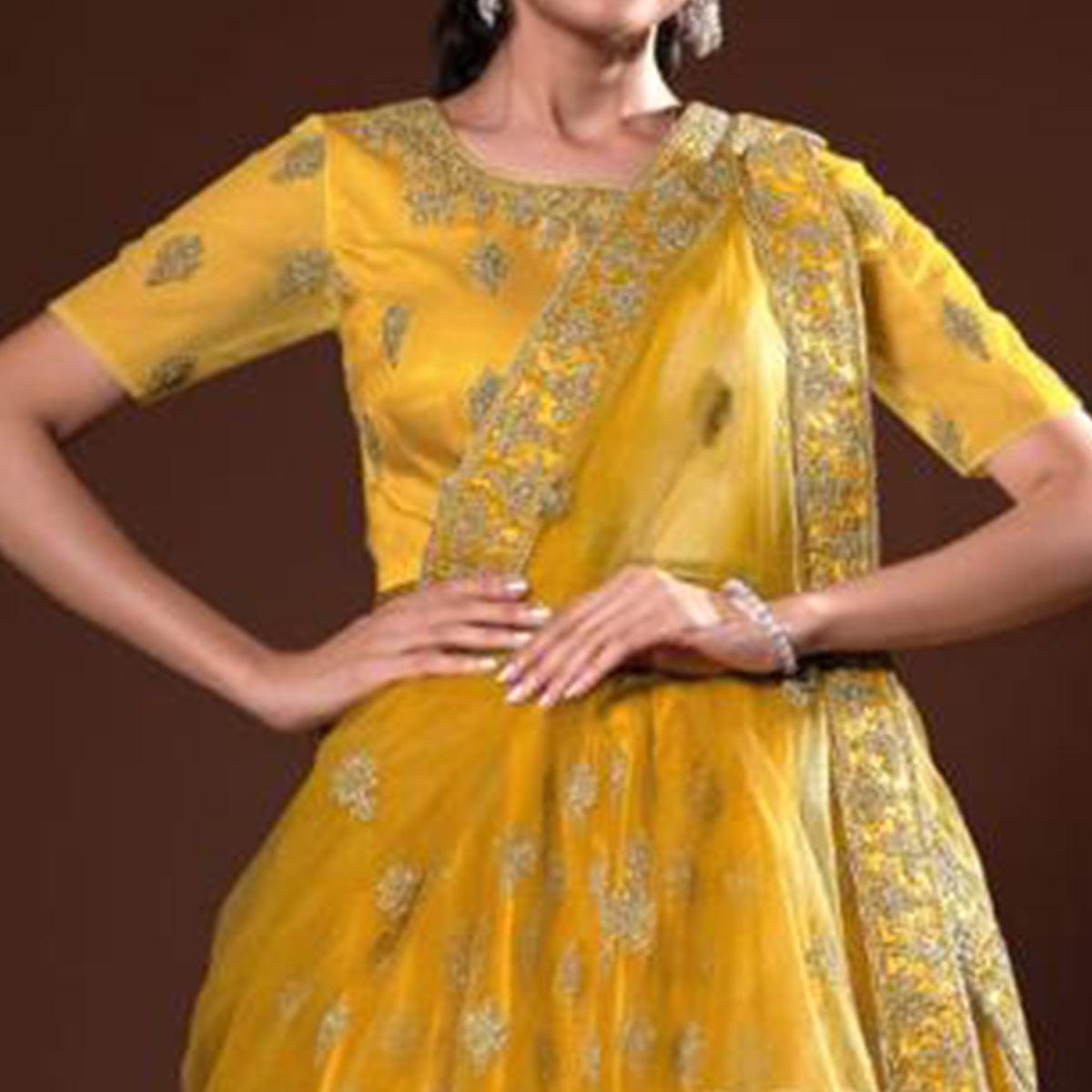 Mustard Embroidered Net Lehenga Choli - Peachmode