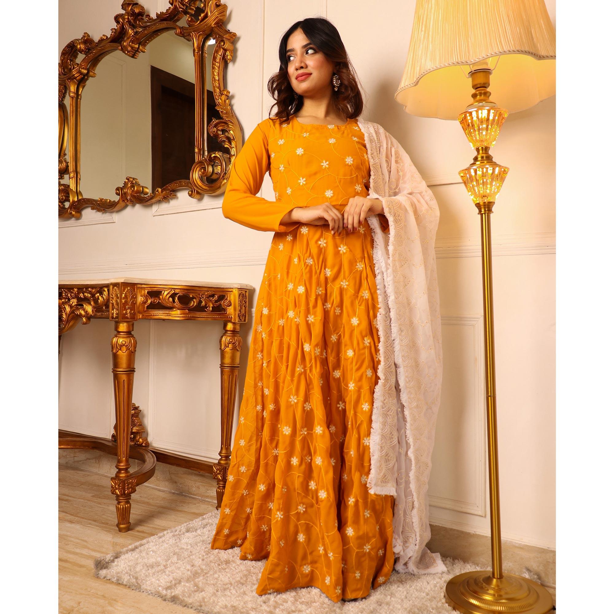 Mustard Floral Embroidered Georgette Gown With Dupatta - Peachmode