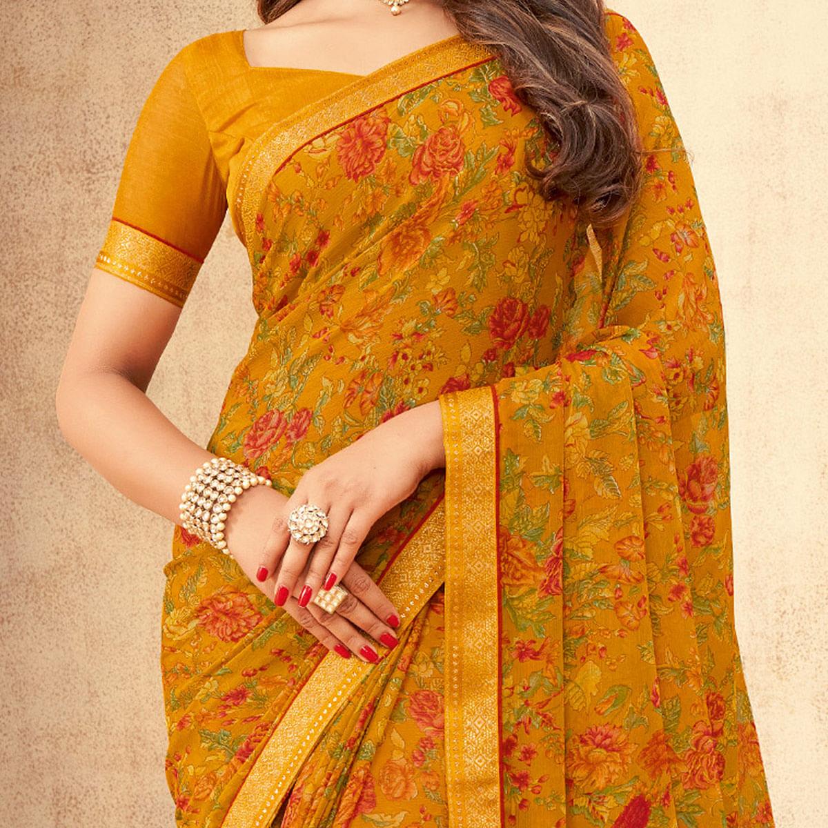 Mustard Floral Printed Chiffon Saree With Tassels - Peachmode