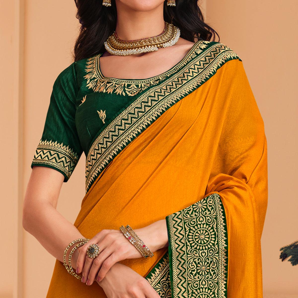Mustard Solid Vichitra Silk Saree With Tassels - Peachmode