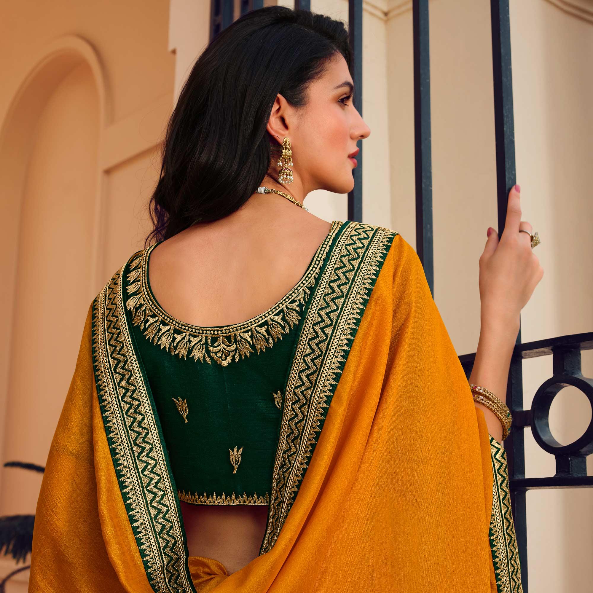 Mustard Solid Vichitra Silk Saree With Tassels - Peachmode