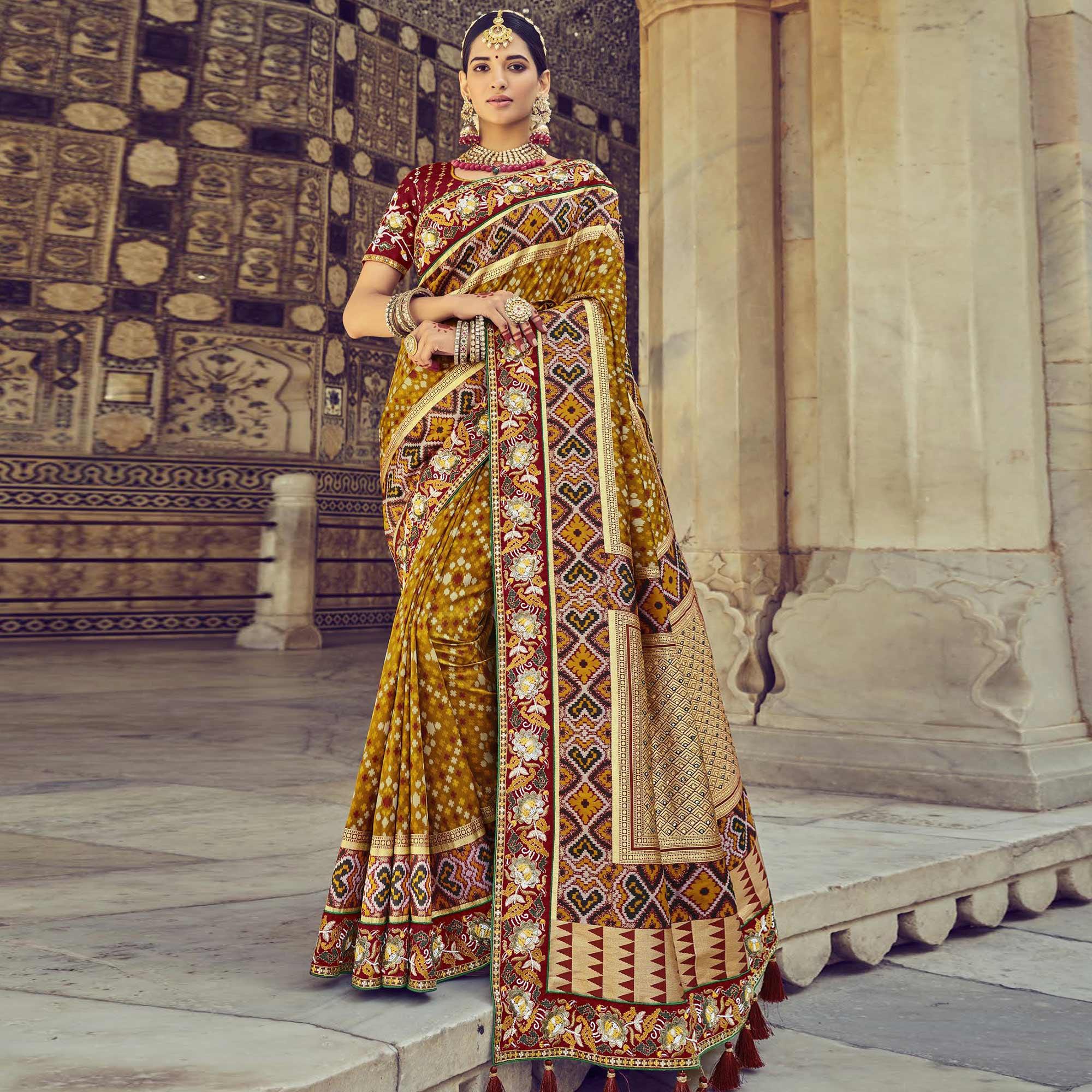 Mustard Wedding Wear Resham With Embellished Silk Bhandhani Patola Saree - Peachmode
