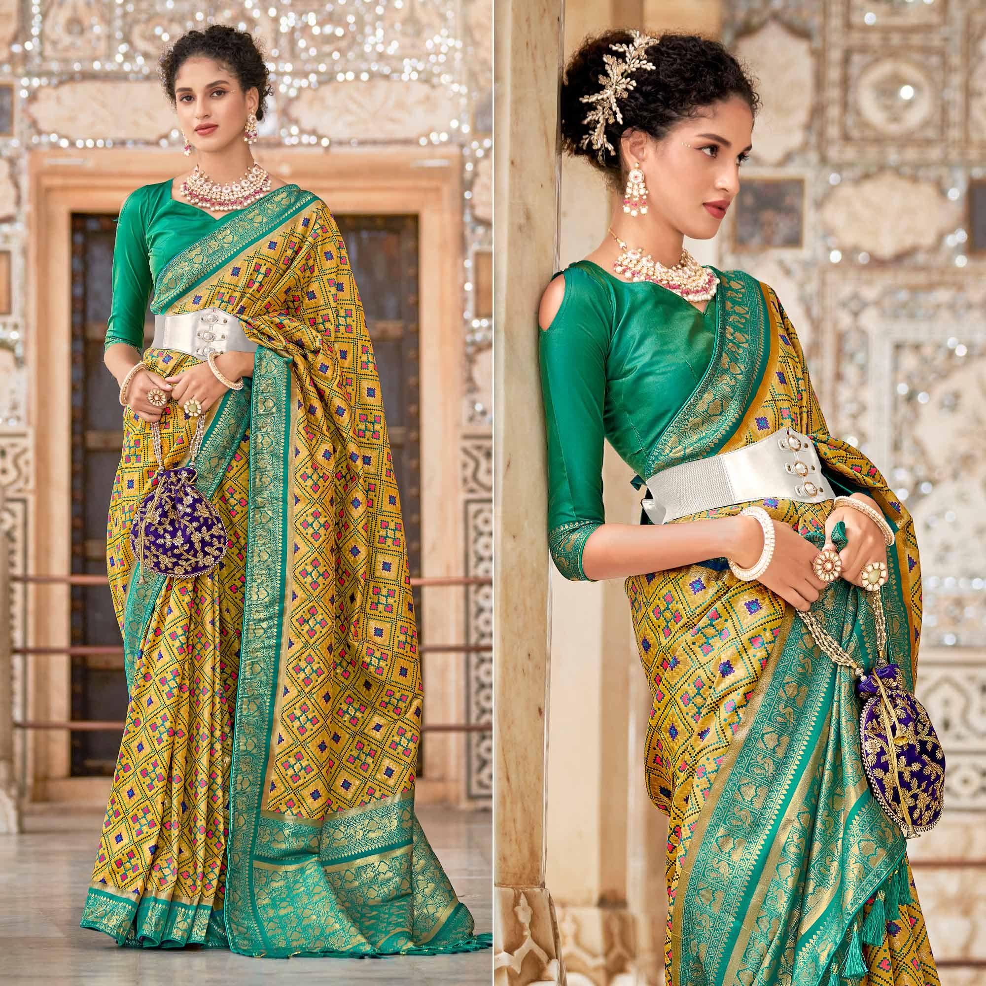 Mustard Woven Art Silk Patola Saree With Tassels - Peachmode