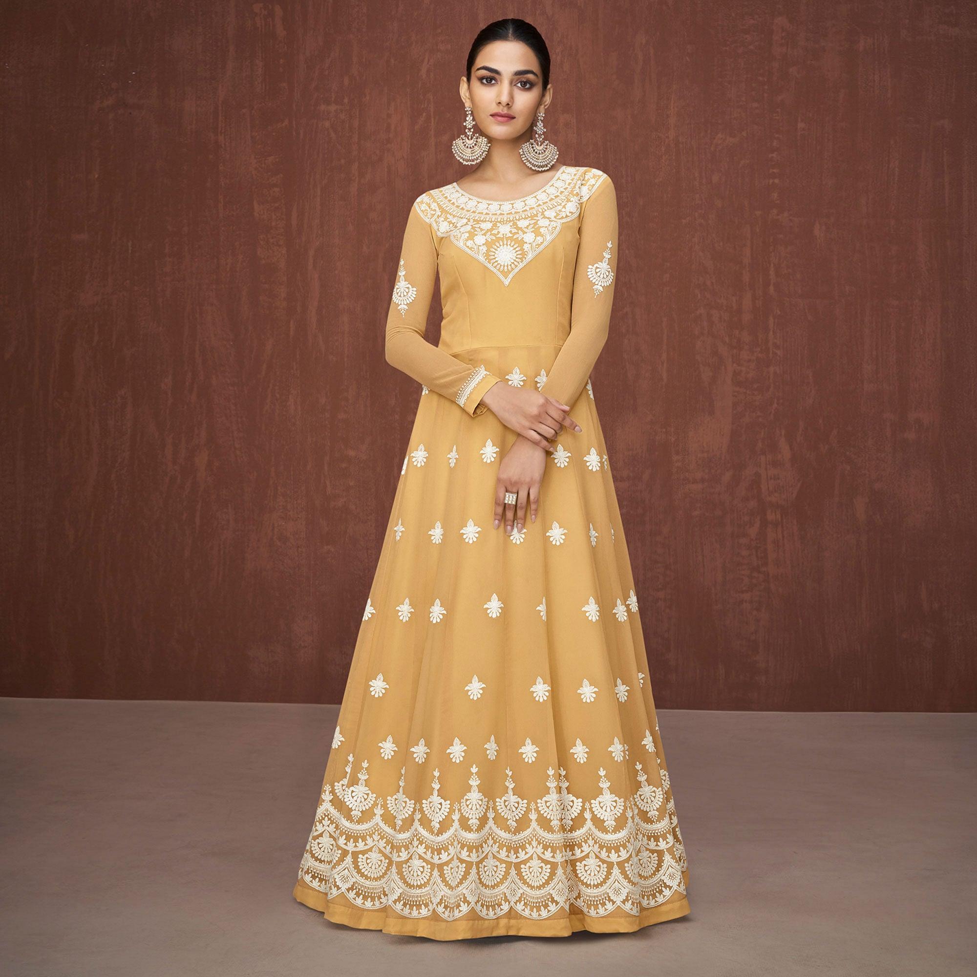 Mustard Yellow Party Wear Heavy Embroidered Georgette Gown - Peachmode