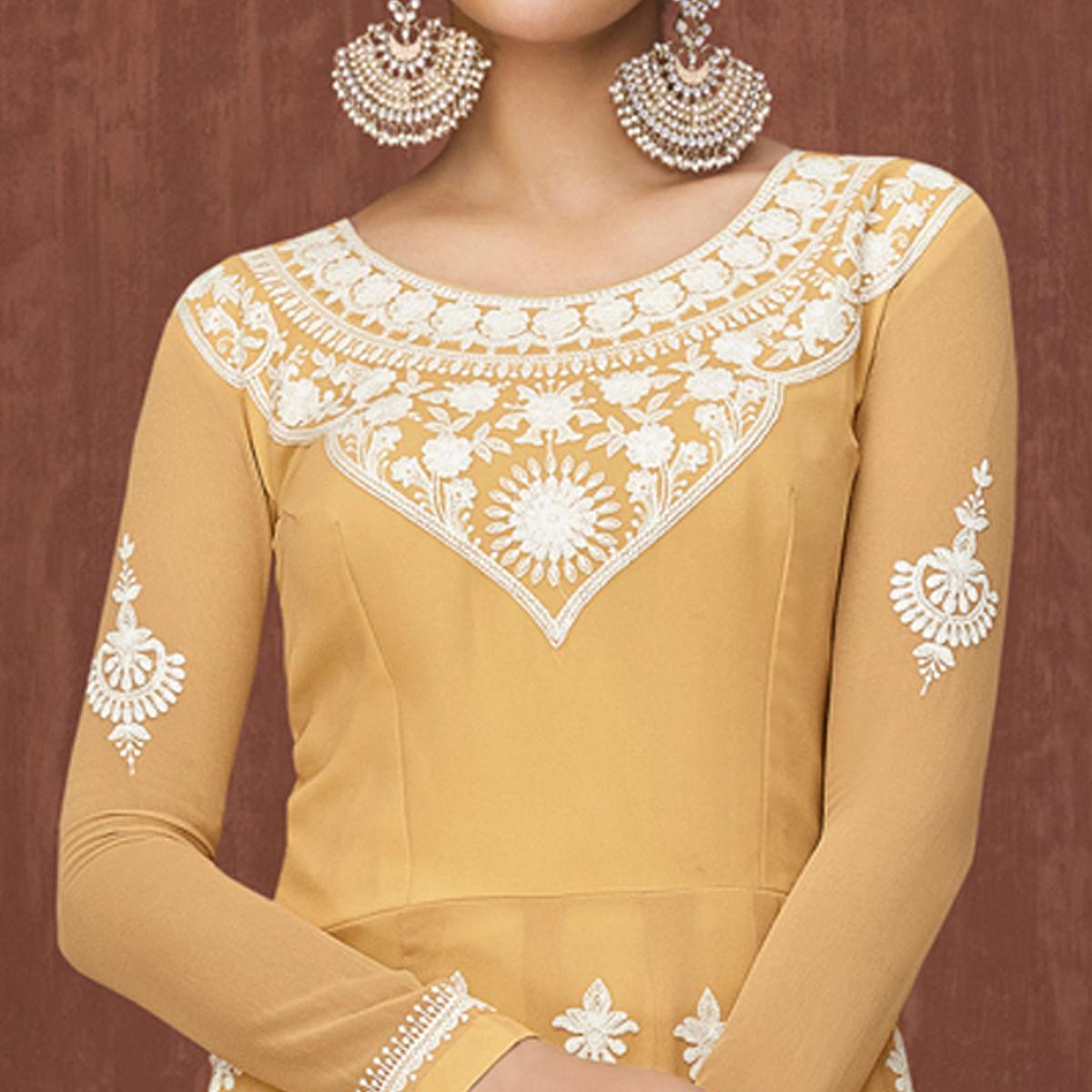 Mustard Yellow Party Wear Heavy Embroidered Georgette Gown - Peachmode