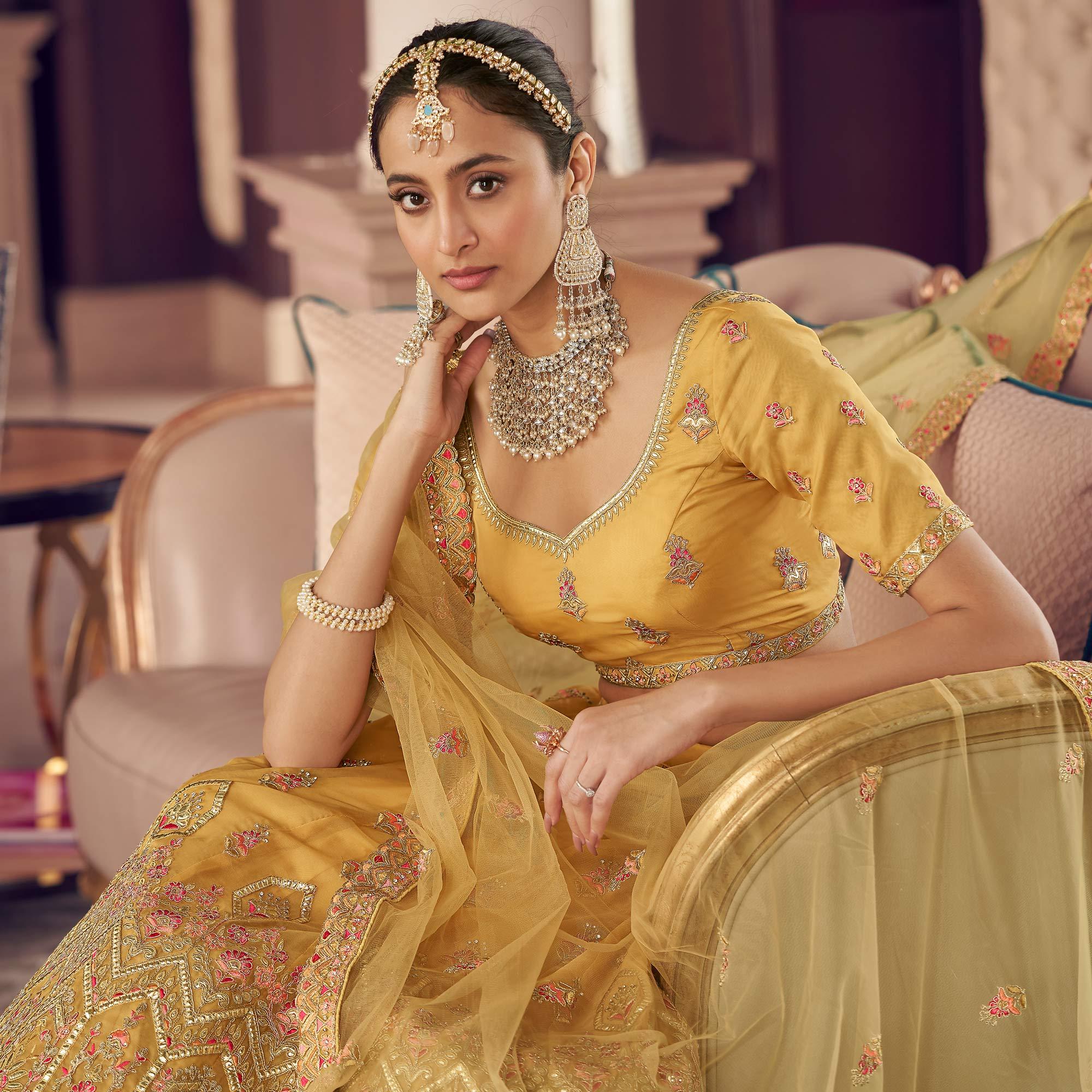 Mustard-Yellow Partywear Embroidered Organza Lehenga Choli - Peachmode