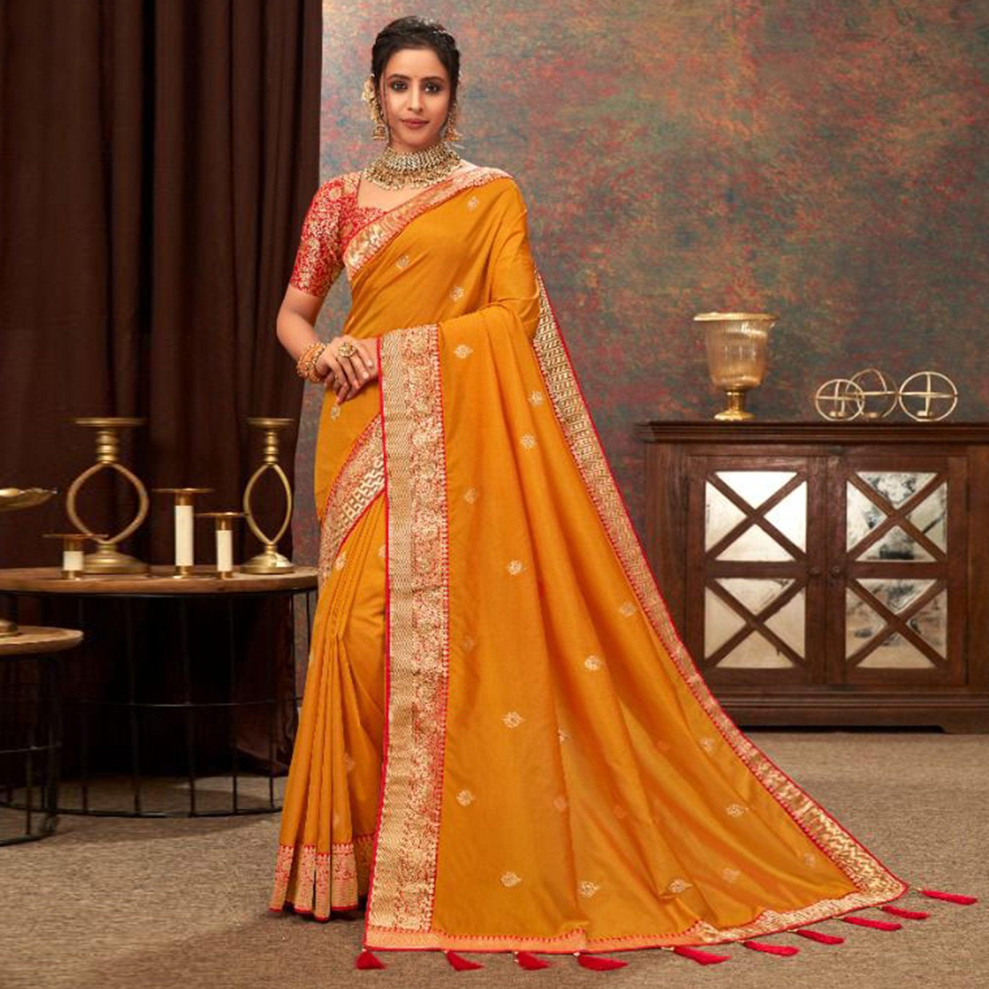 Mustard Yellow Woven Pure Silk Saree With Tassels - Peachmode