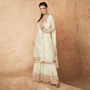 Off-White Floral Embroidered Georgette Partywear Palazzo Suit - Peachmode