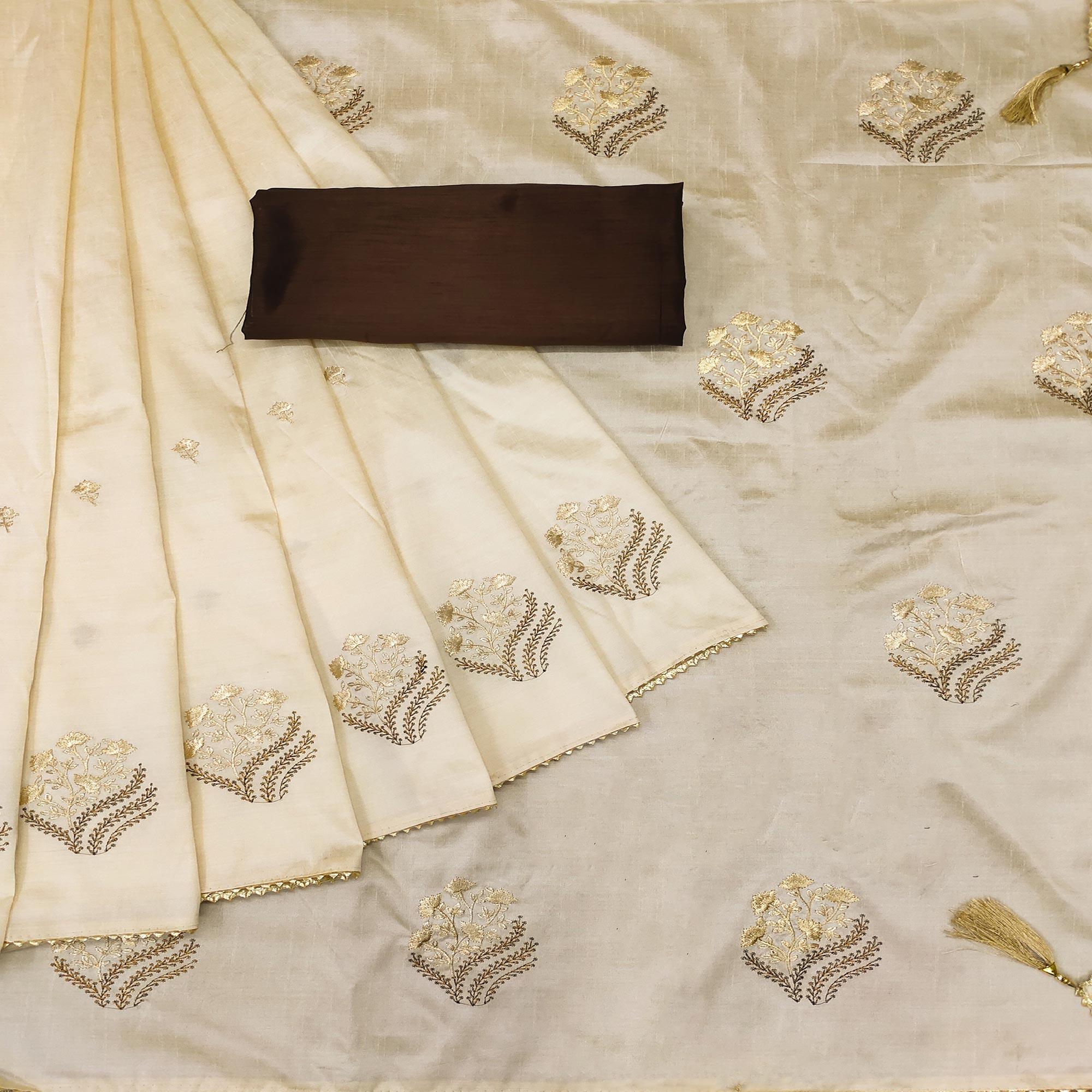 Off White Floral Embroidered Silk Saree - Peachmode