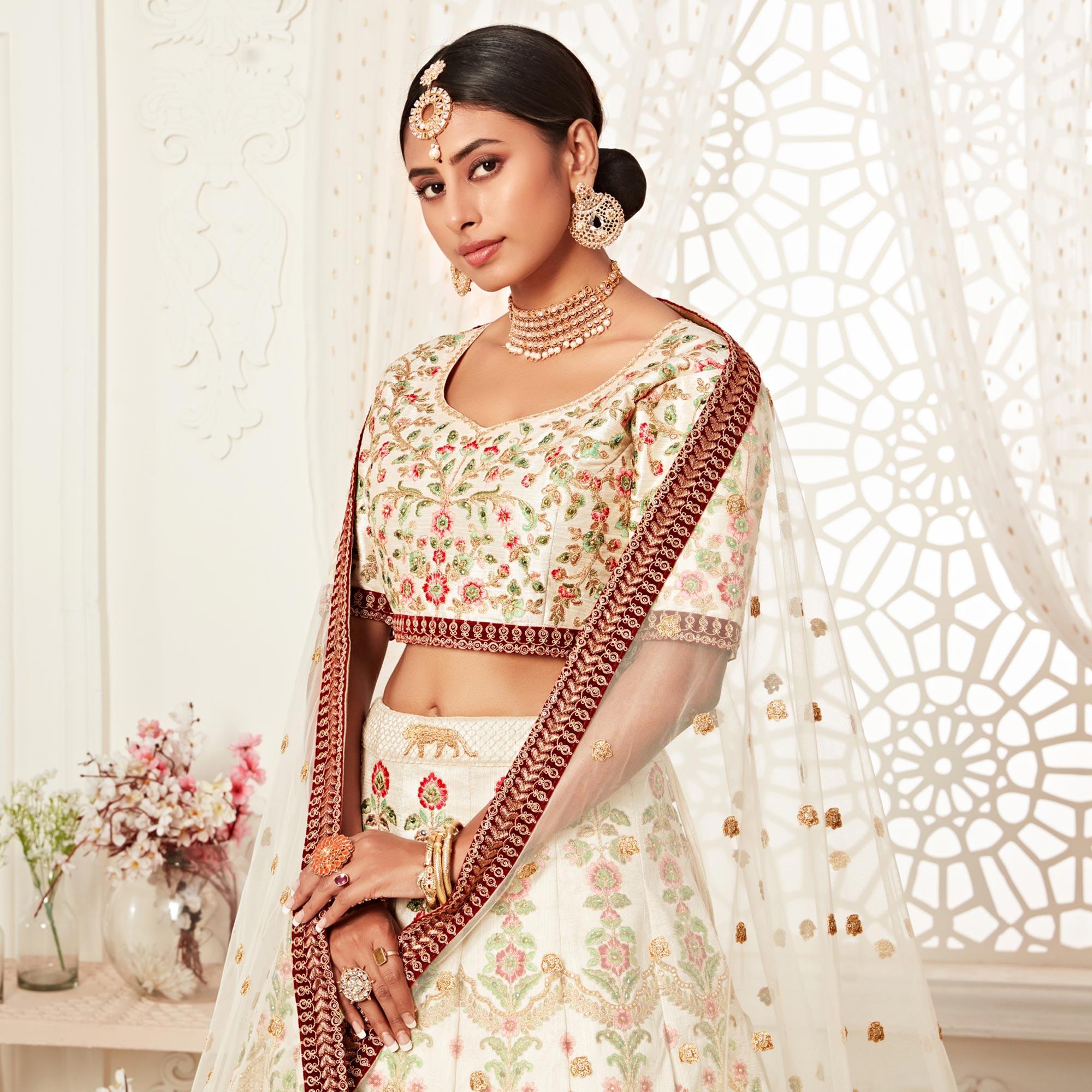 Off White Wedding Wear Floral Sequins Embroidered With Diamond Art Silk Lehenga Choli - Peachmode