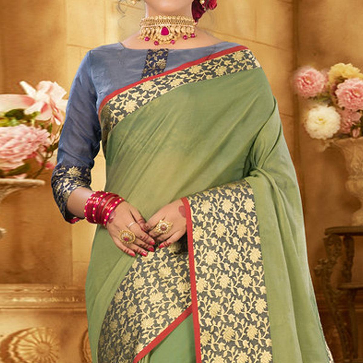 Olive Green Colored Festive Wear Woven Jute Saree - Peachmode