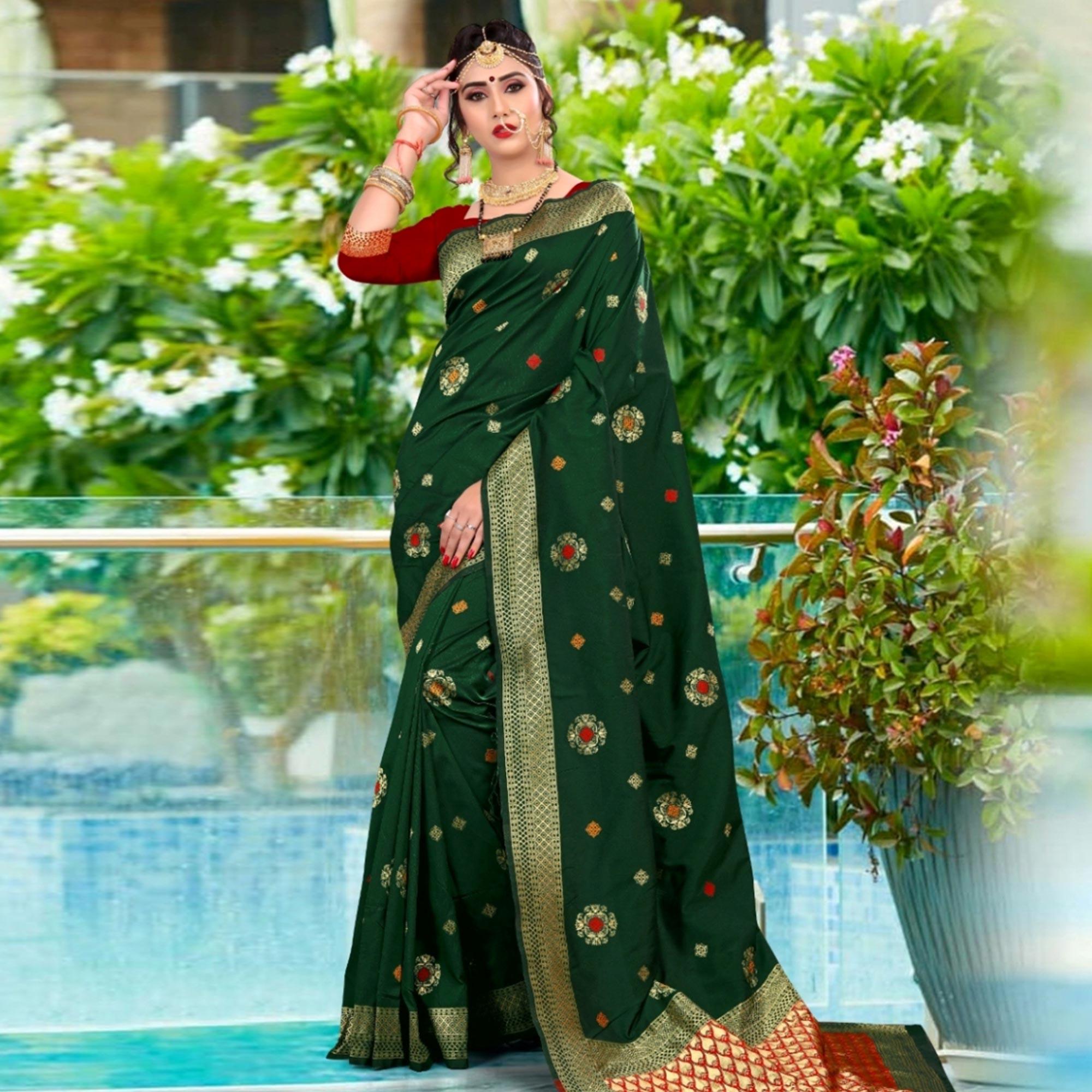 Opulent Dark Green Colored Festive Wear Woven Lichi Silk Saree - Peachmode