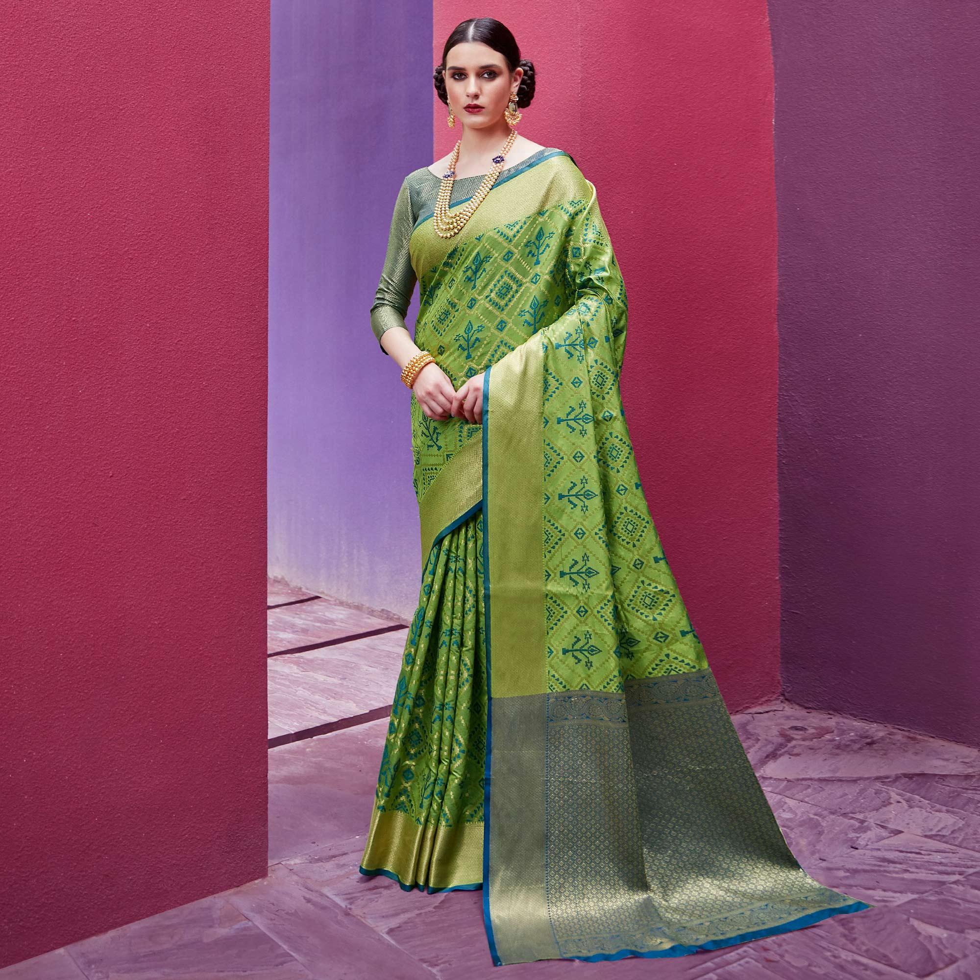Opulent Green Colored Festive Wear Woven Indian Patola Silk Saree - Peachmode