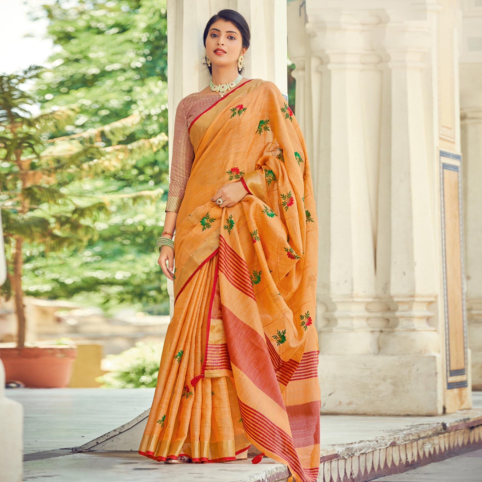 Orange Embroidered Linen Saree With Tassels - Peachmode