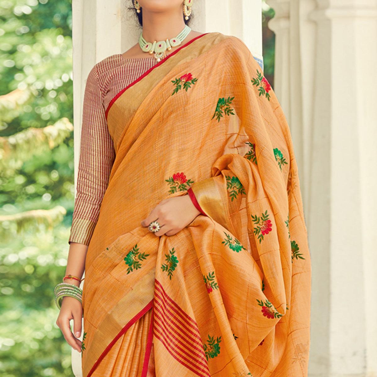 Orange Embroidered Linen Saree With Tassels - Peachmode