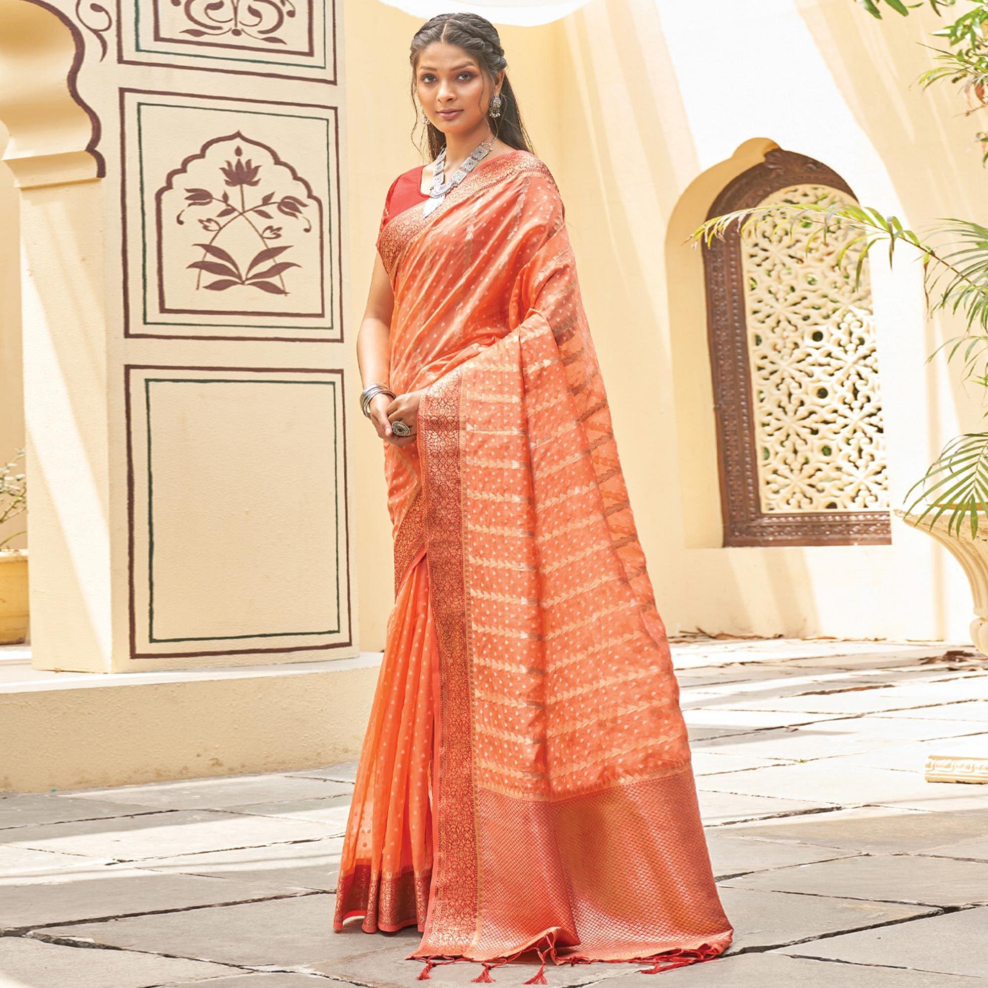 Orange Festive Wear Woven Organza Saree With Tassels - Peachmode