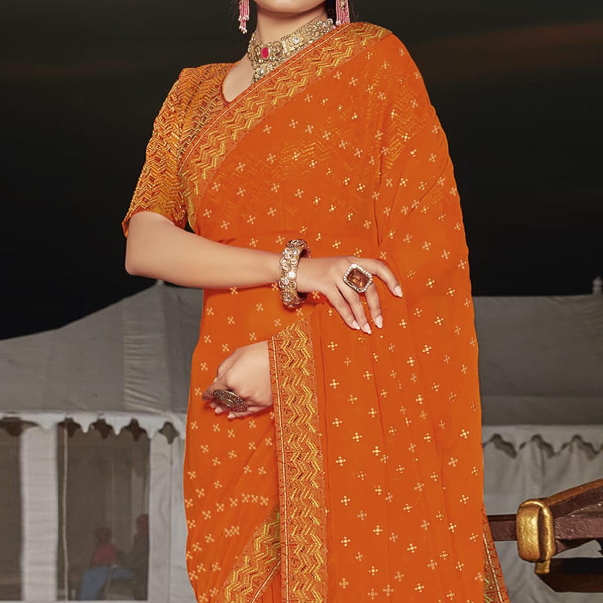 Orange Partywear Embellished Chiffon Saree - Peachmode